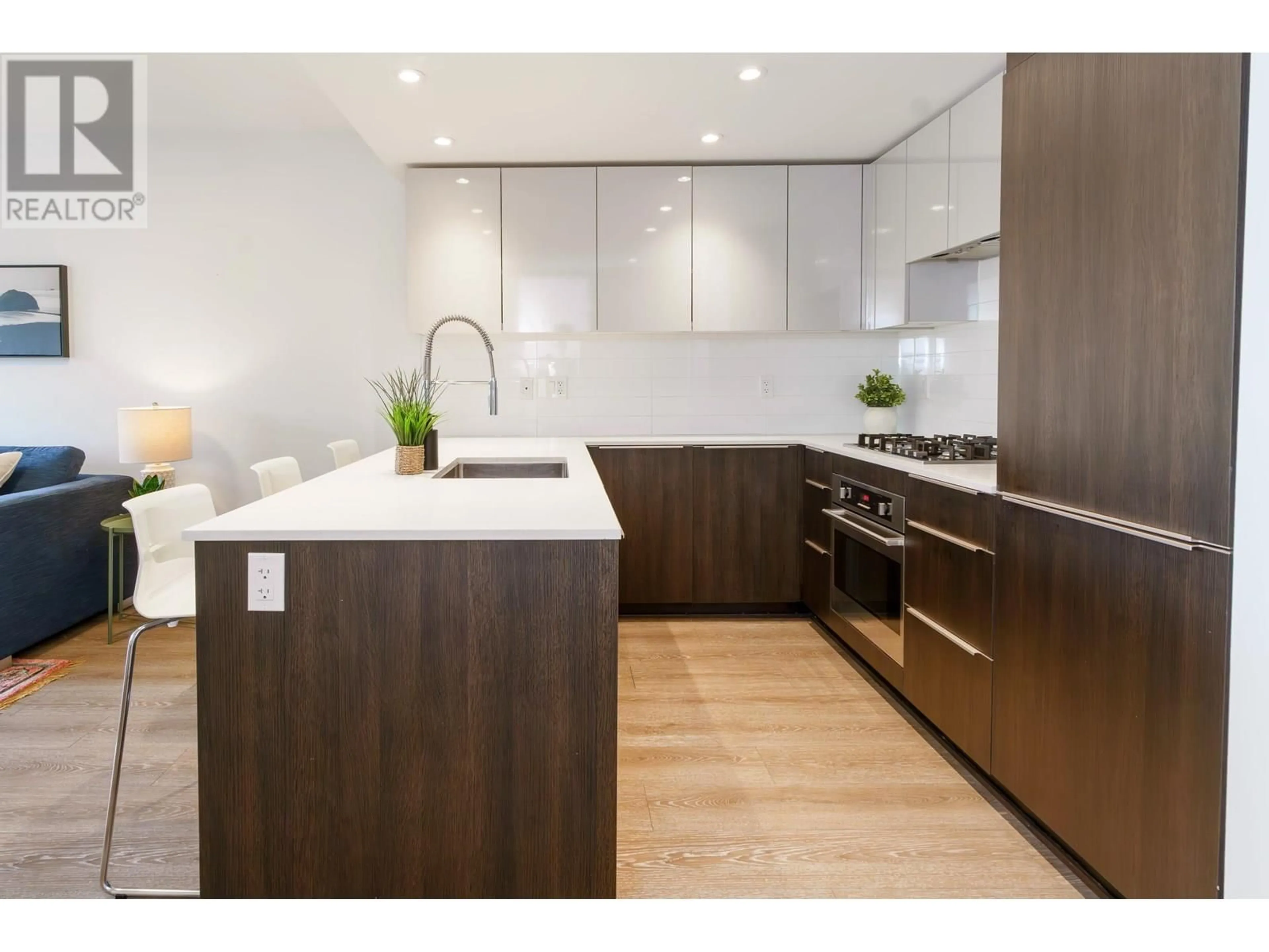 Contemporary kitchen, wood/laminate floor for 317 - 1588 HASTINGS STREET, Vancouver British Columbia V5L0B8