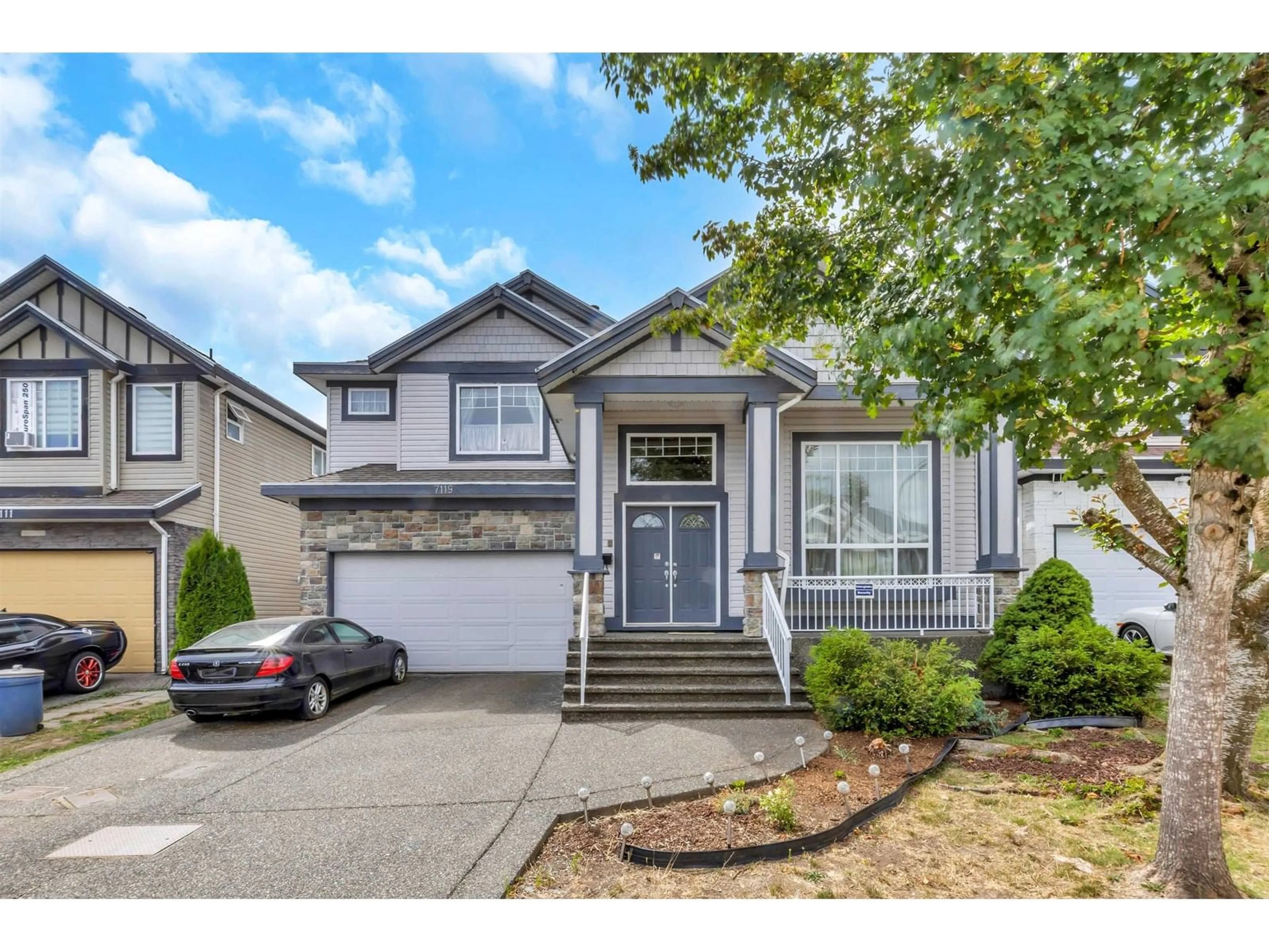 Home with vinyl exterior material, street for 7119 148A, Surrey British Columbia V3S0X3