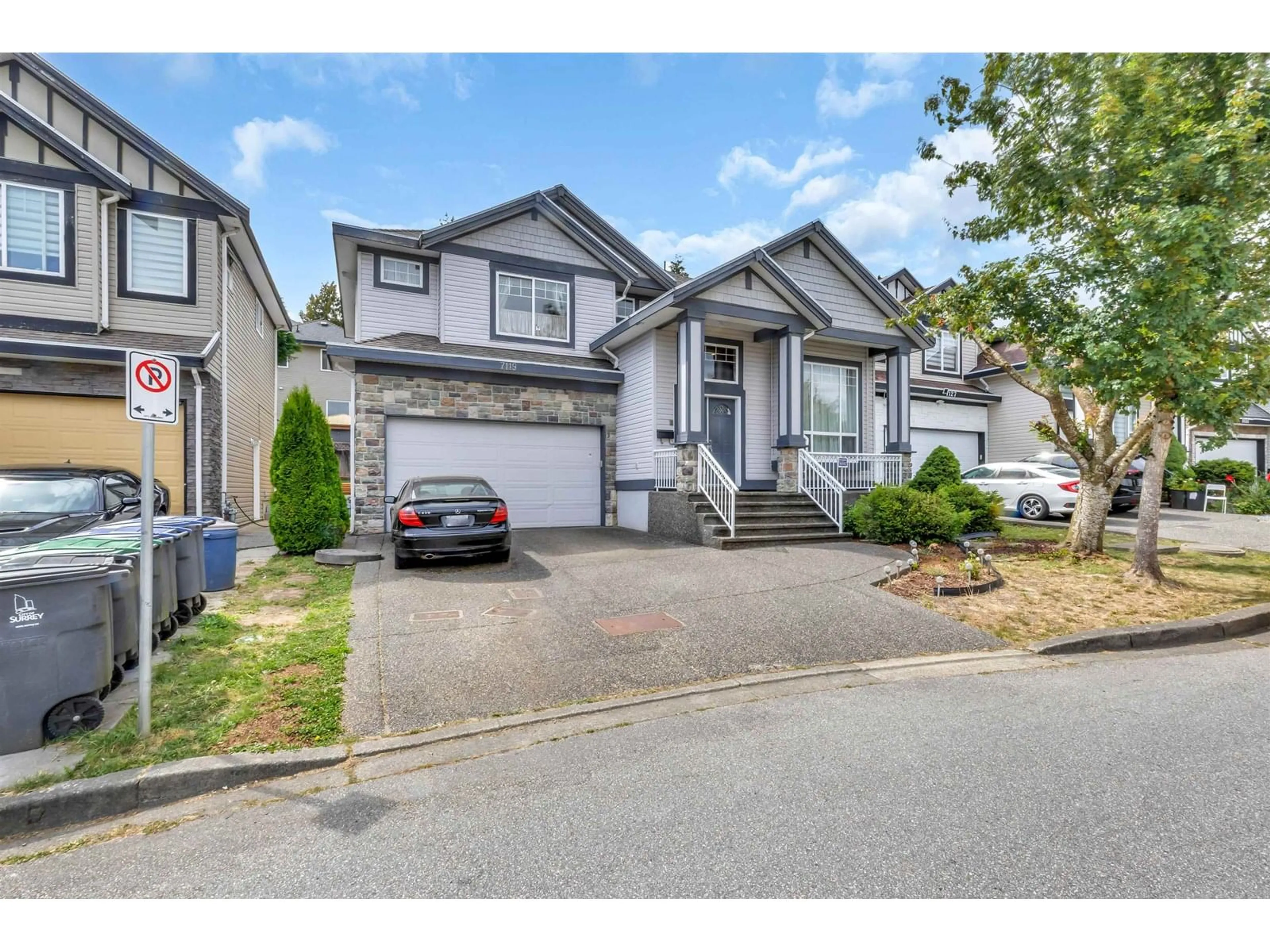 Home with vinyl exterior material, street for 7119 148A, Surrey British Columbia V3S0X3