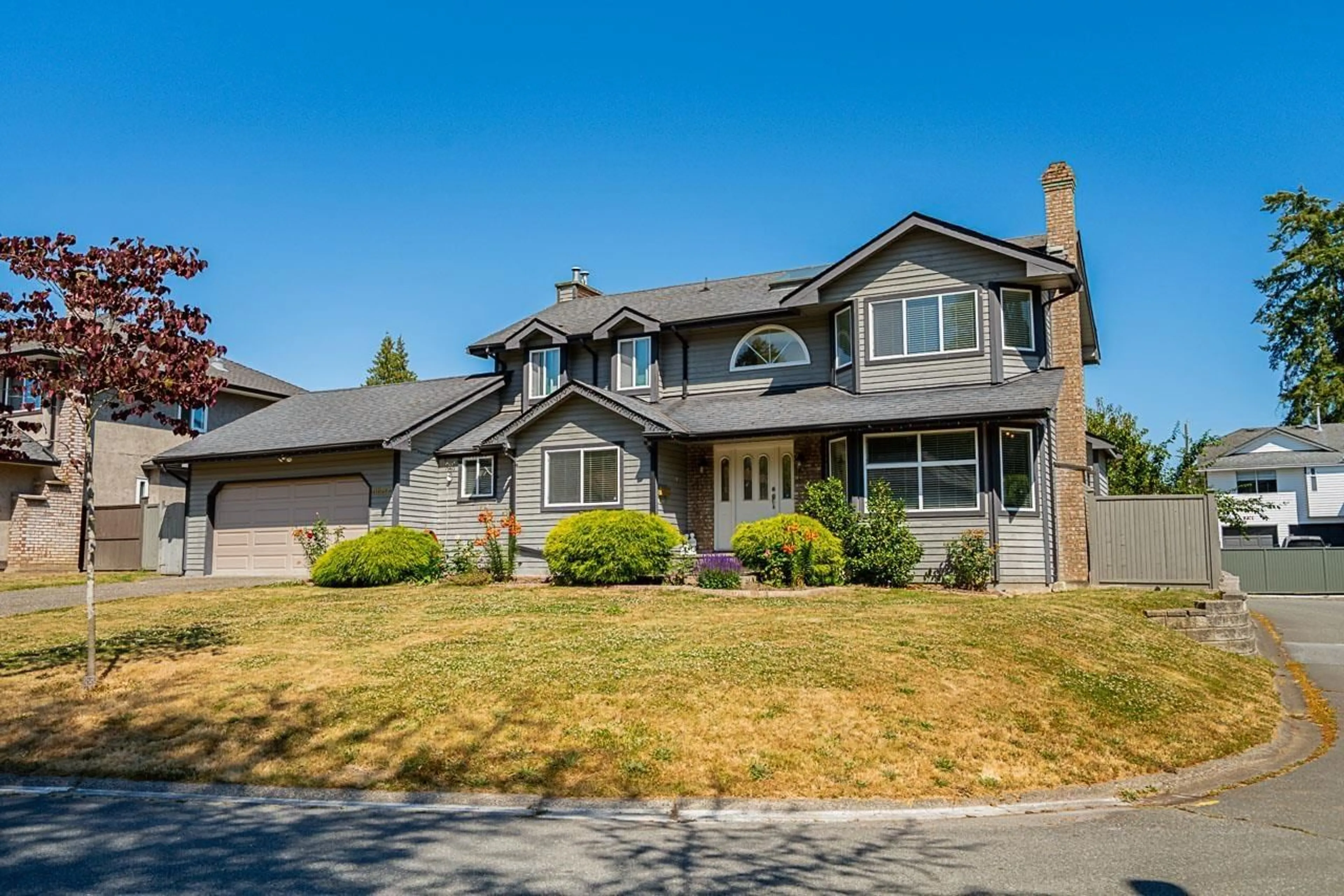Home with vinyl exterior material, street for 8682 143A, Surrey British Columbia V3W0K4