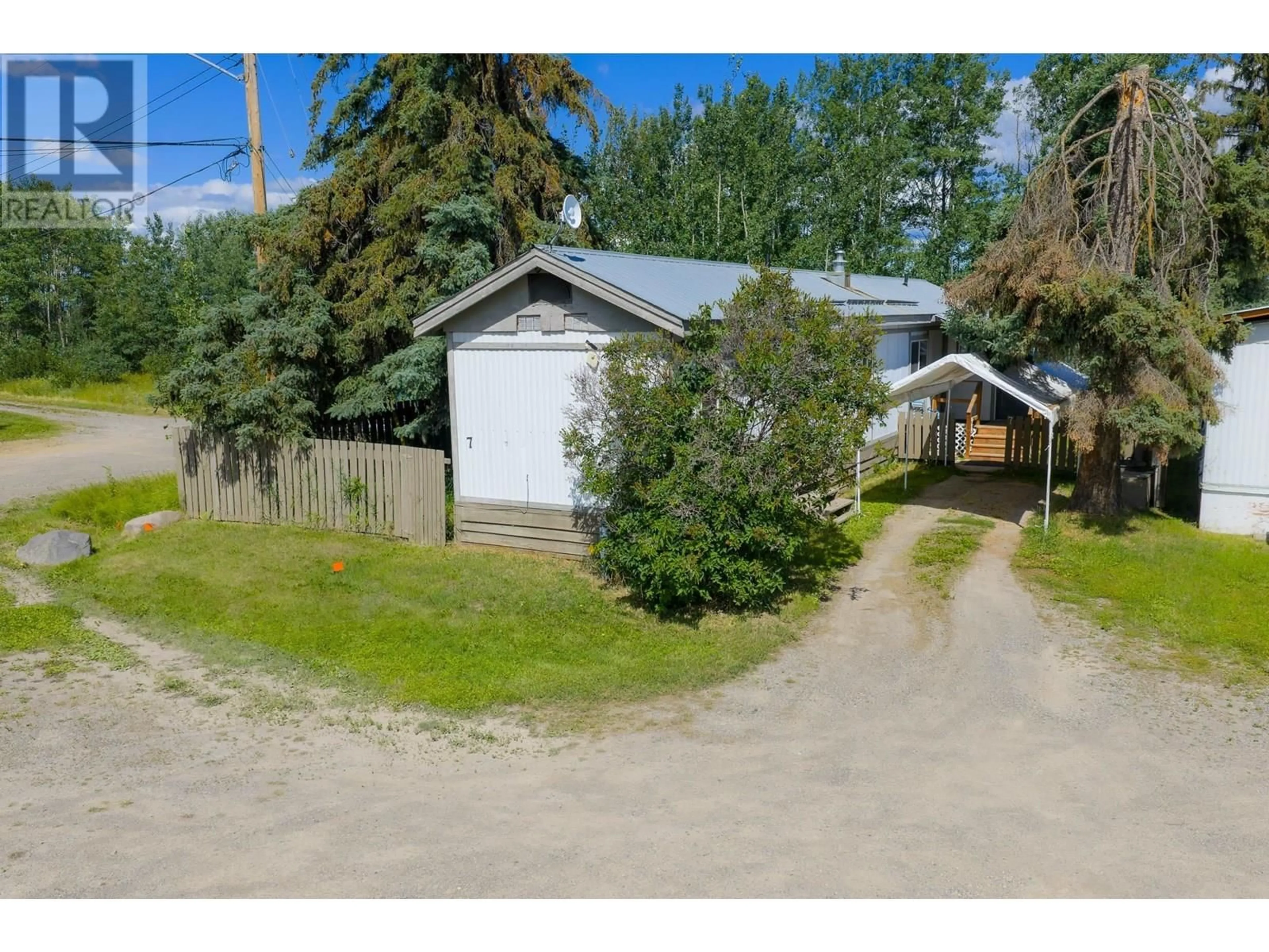 A pic from outside/outdoor area/front of a property/back of a property/a pic from drone, street for 7 - 2091 16 HIGHWAY, Vanderhoof British Columbia V0J3A0