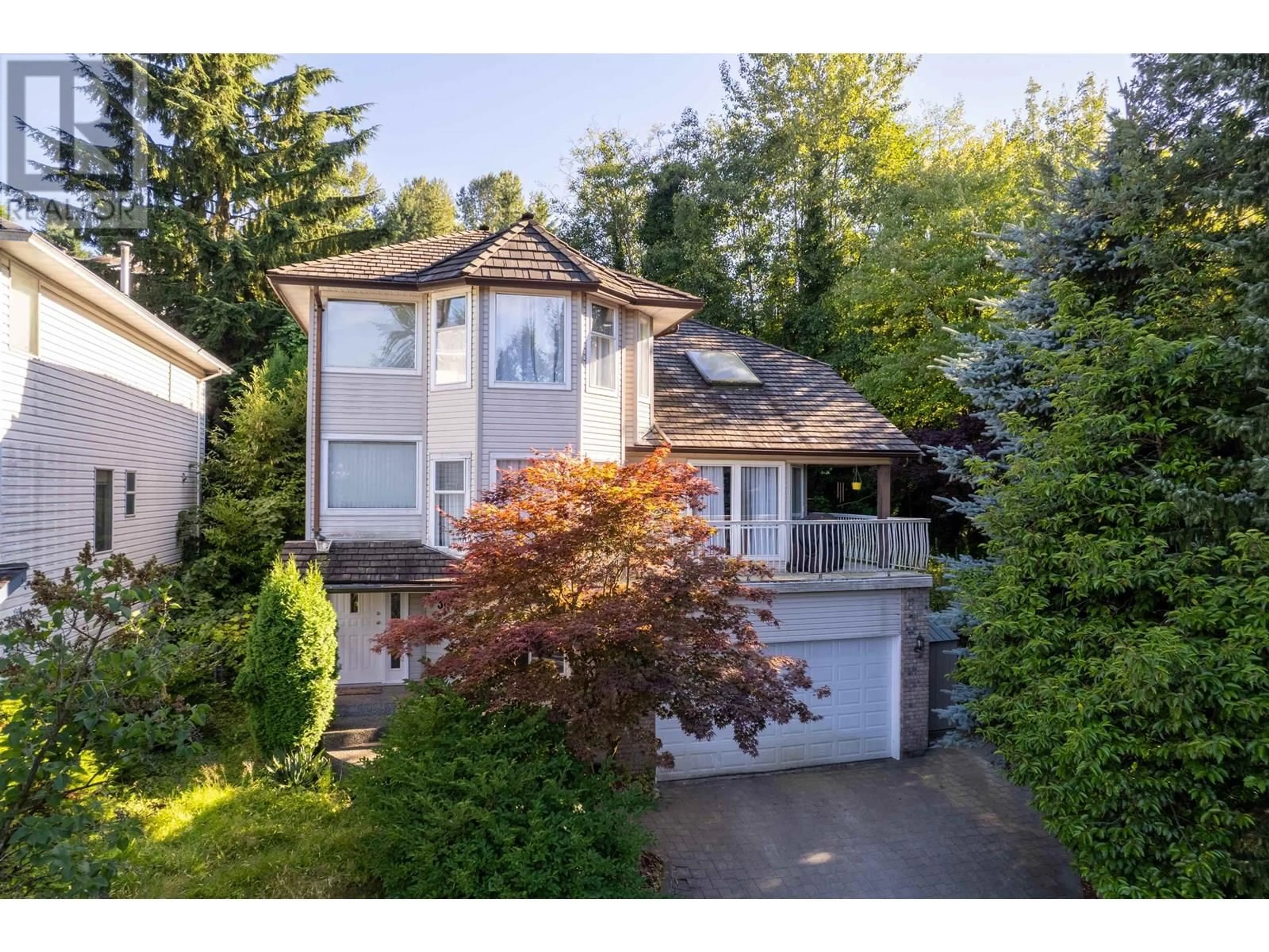 Home with vinyl exterior material, street for 1038 WINDWARD DRIVE, Coquitlam British Columbia V3C5S6
