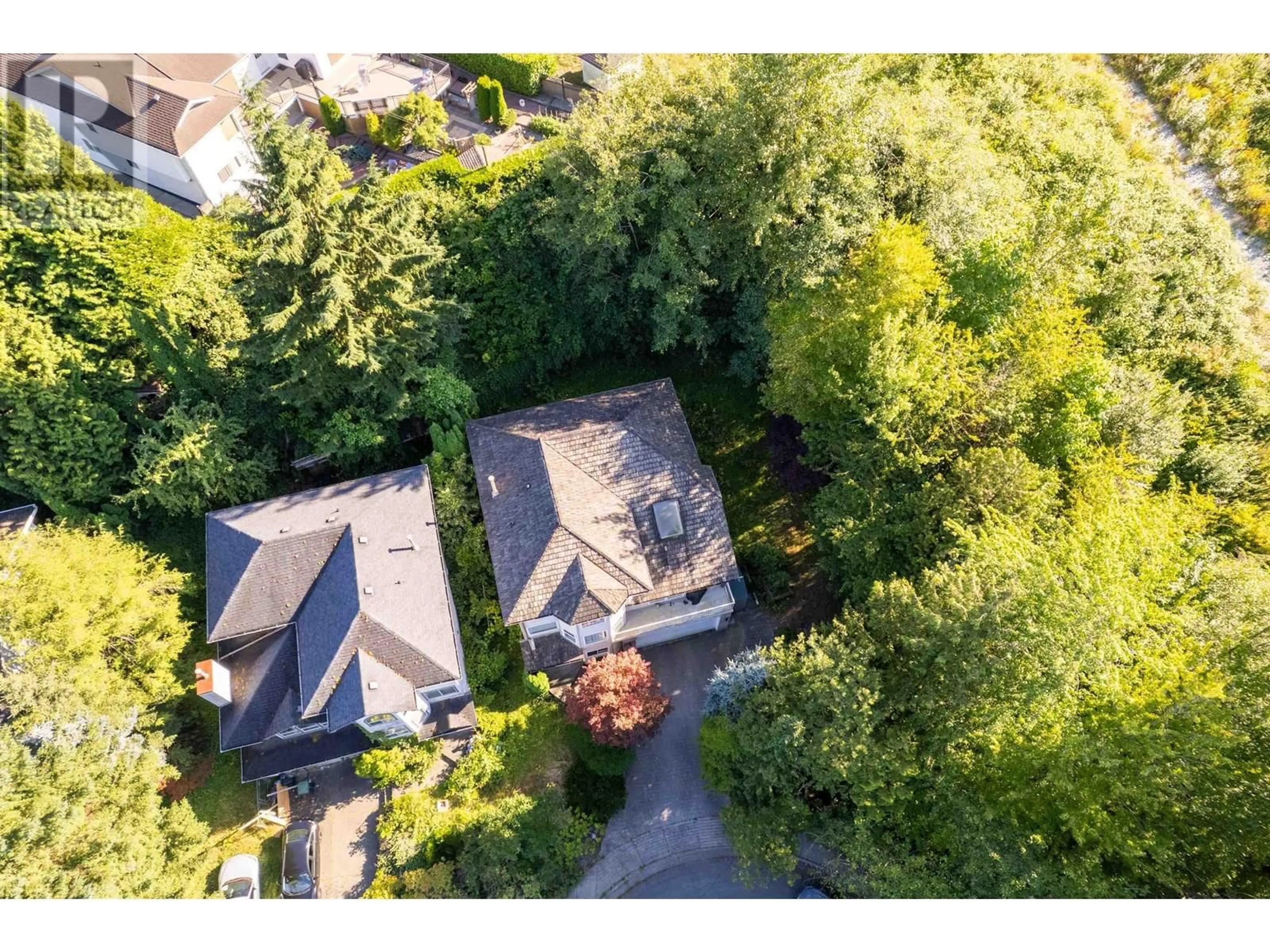 A pic from outside/outdoor area/front of a property/back of a property/a pic from drone, forest/trees view for 1038 WINDWARD DRIVE, Coquitlam British Columbia V3C5S6
