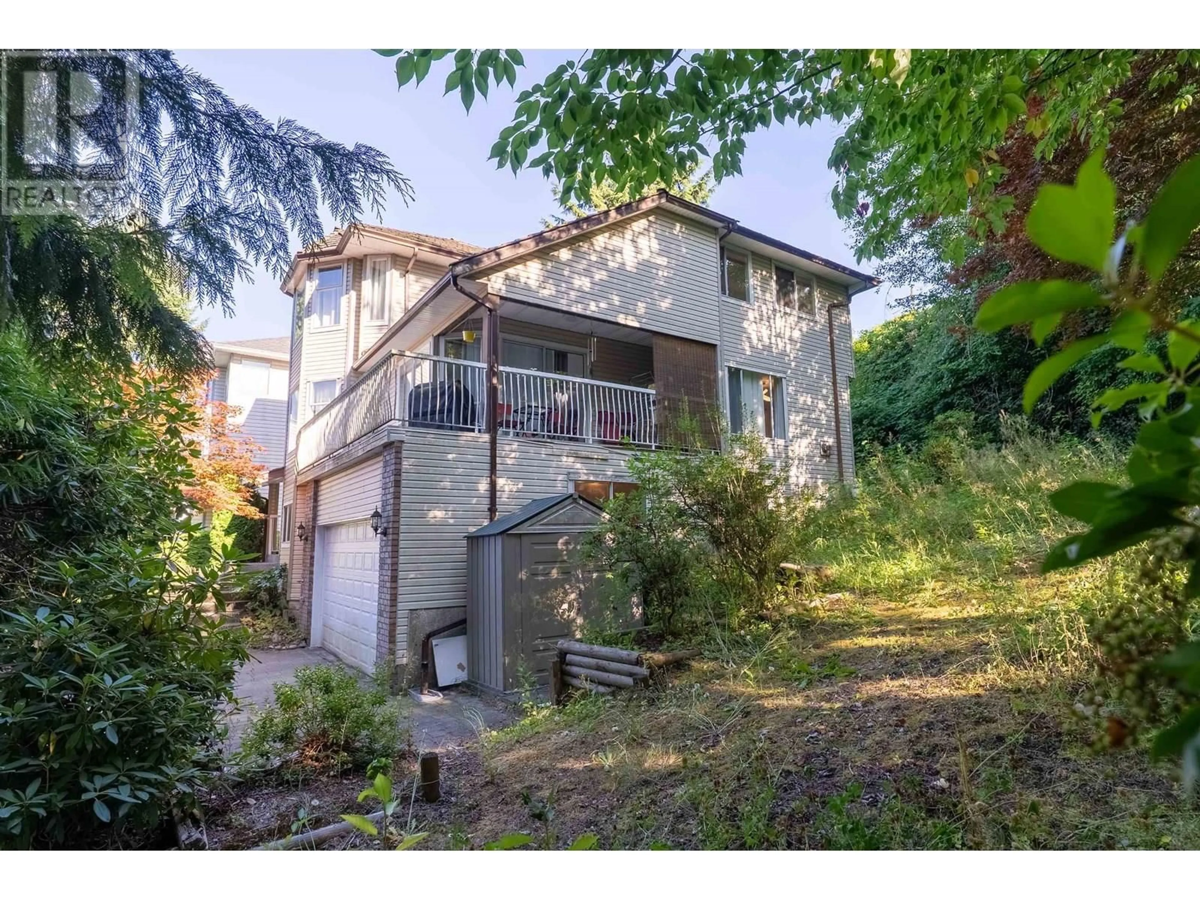 A pic from outside/outdoor area/front of a property/back of a property/a pic from drone, street for 1038 WINDWARD DRIVE, Coquitlam British Columbia V3C5S6