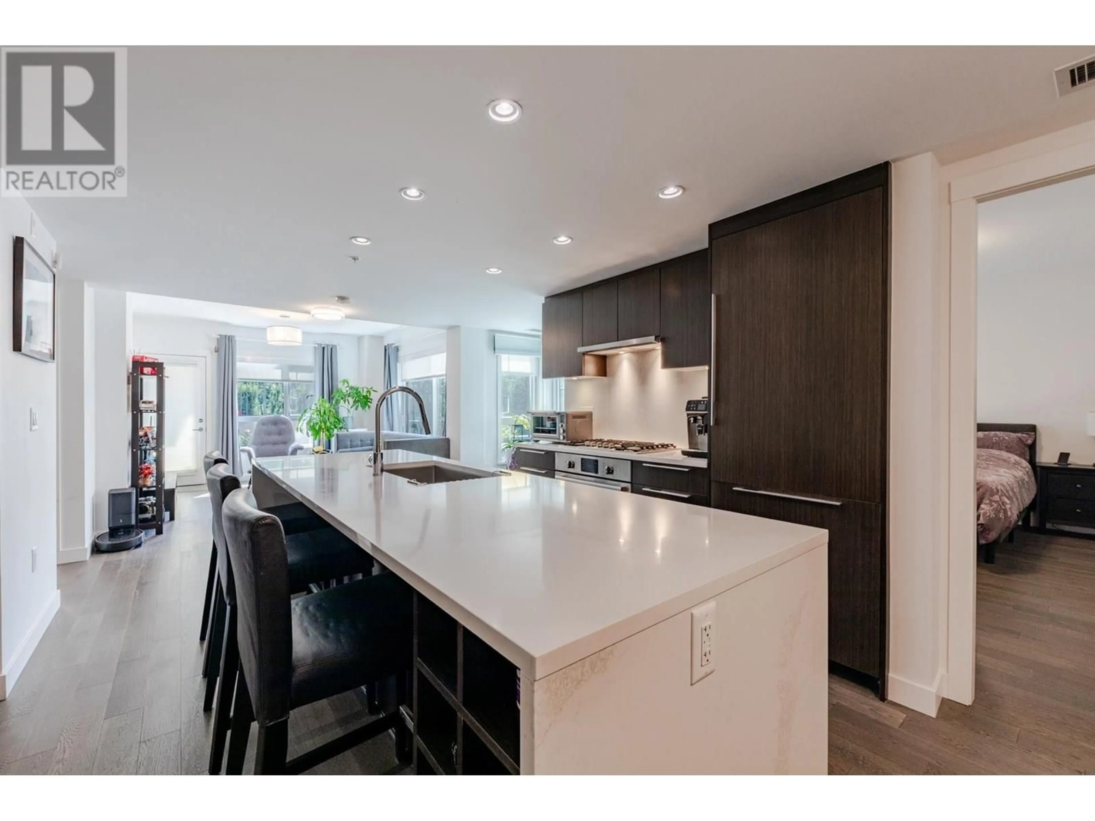 Open concept kitchen, ceramic/tile floor for 104 - 7828 GRANVILLE STREET, Vancouver British Columbia V6P4Z2