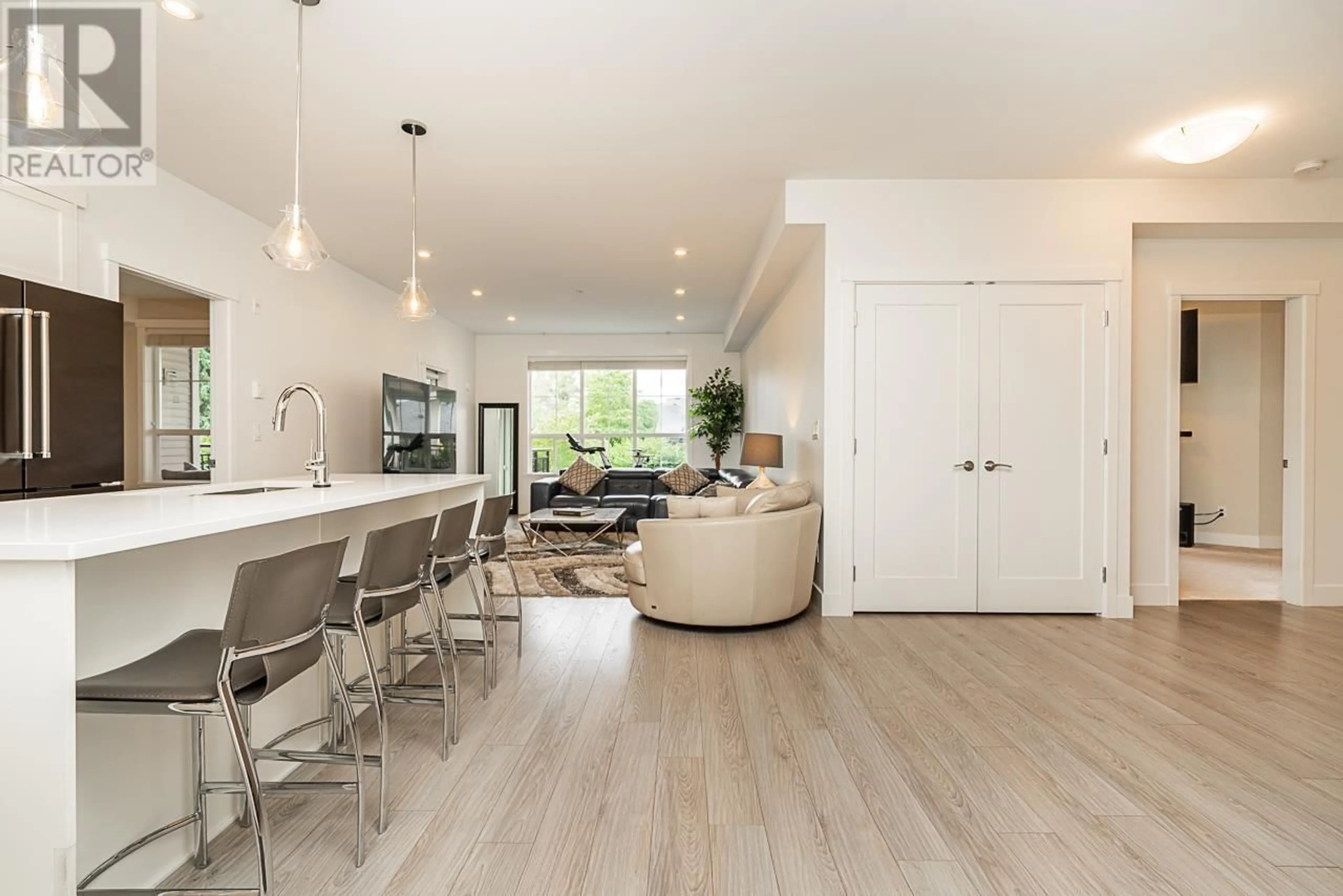 Open concept kitchen, wood/laminate floor for 204 - 12367 224 STREET, Maple Ridge British Columbia V2X6B9
