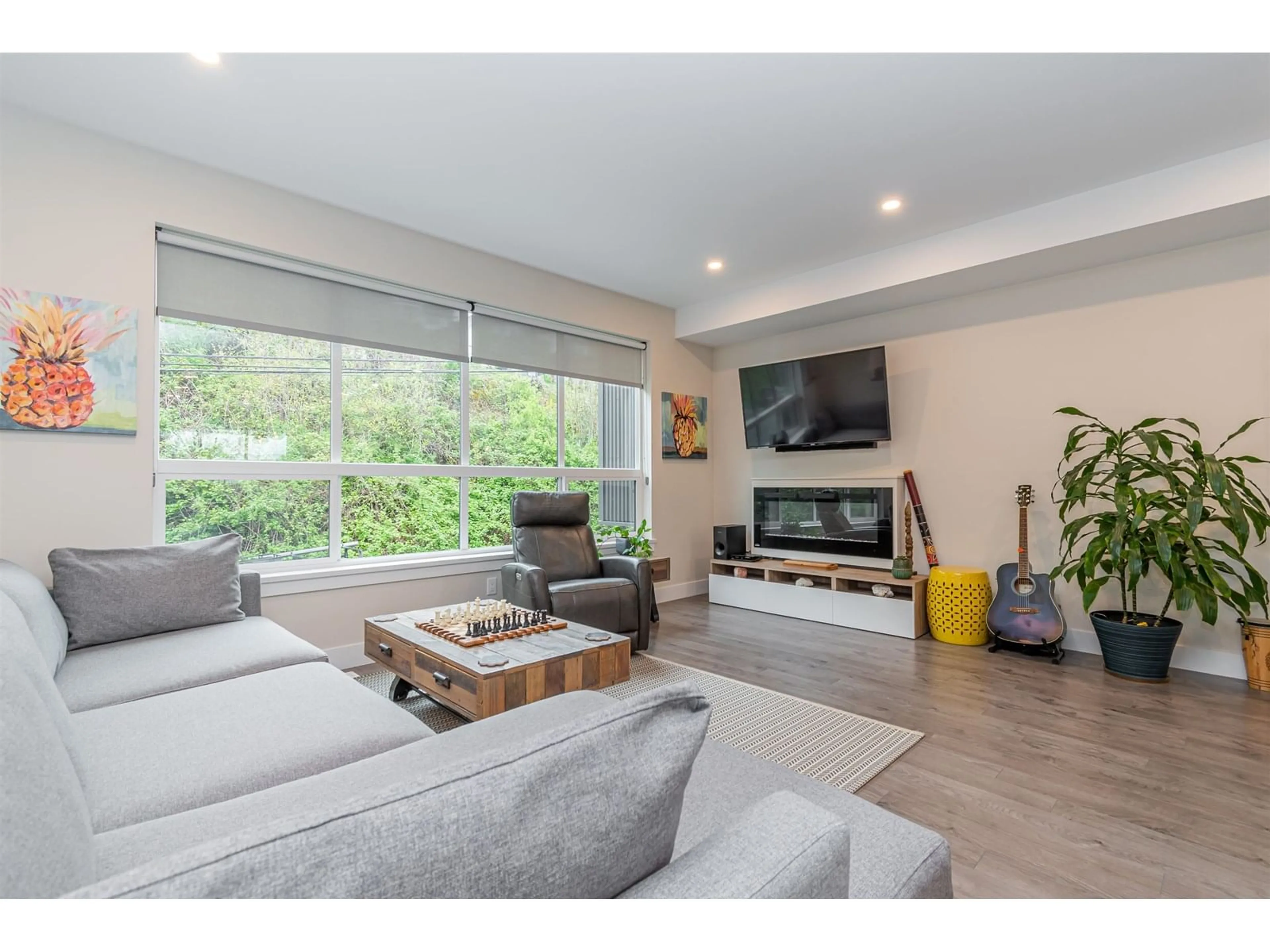 Living room with furniture, wood/laminate floor for 10 - 36130 WATERLEAF, Abbotsford British Columbia V3G0G5