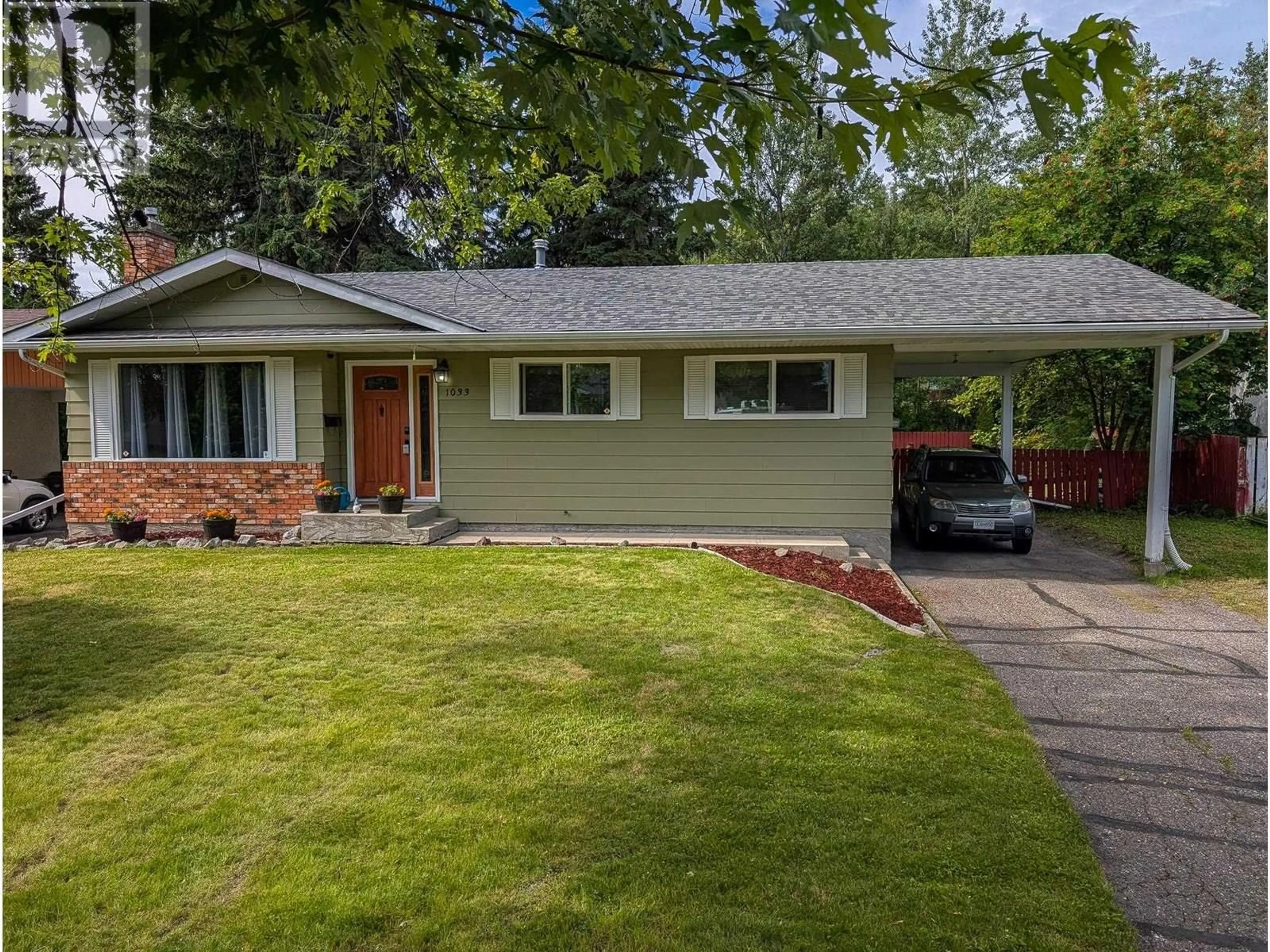 Home with vinyl exterior material, street for 1033 NELSON CRESCENT, Prince George British Columbia V2M5A1