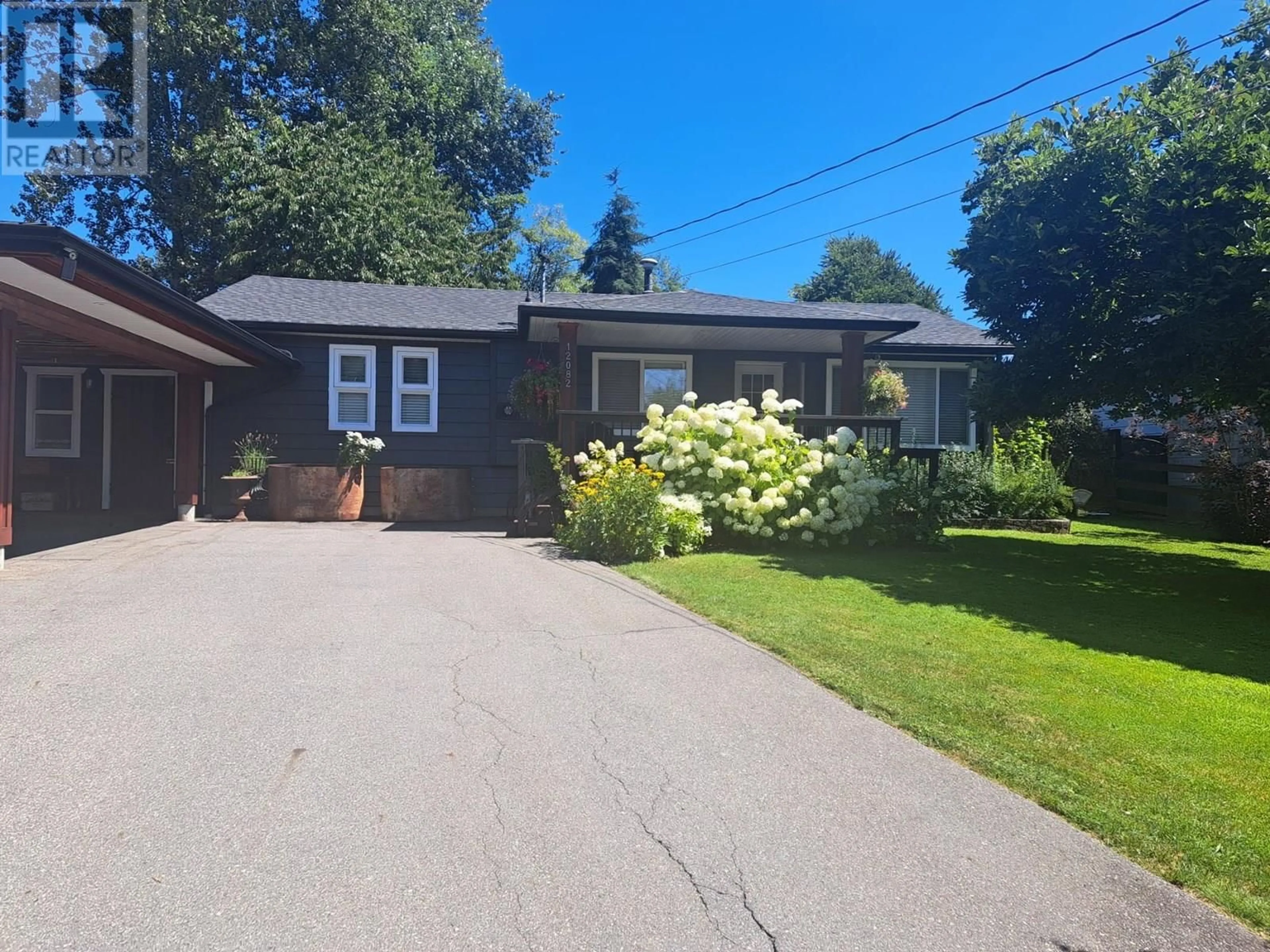 A pic from outside/outdoor area/front of a property/back of a property/a pic from drone, street for 12082 261 STREET, Maple Ridge British Columbia V2W2A6