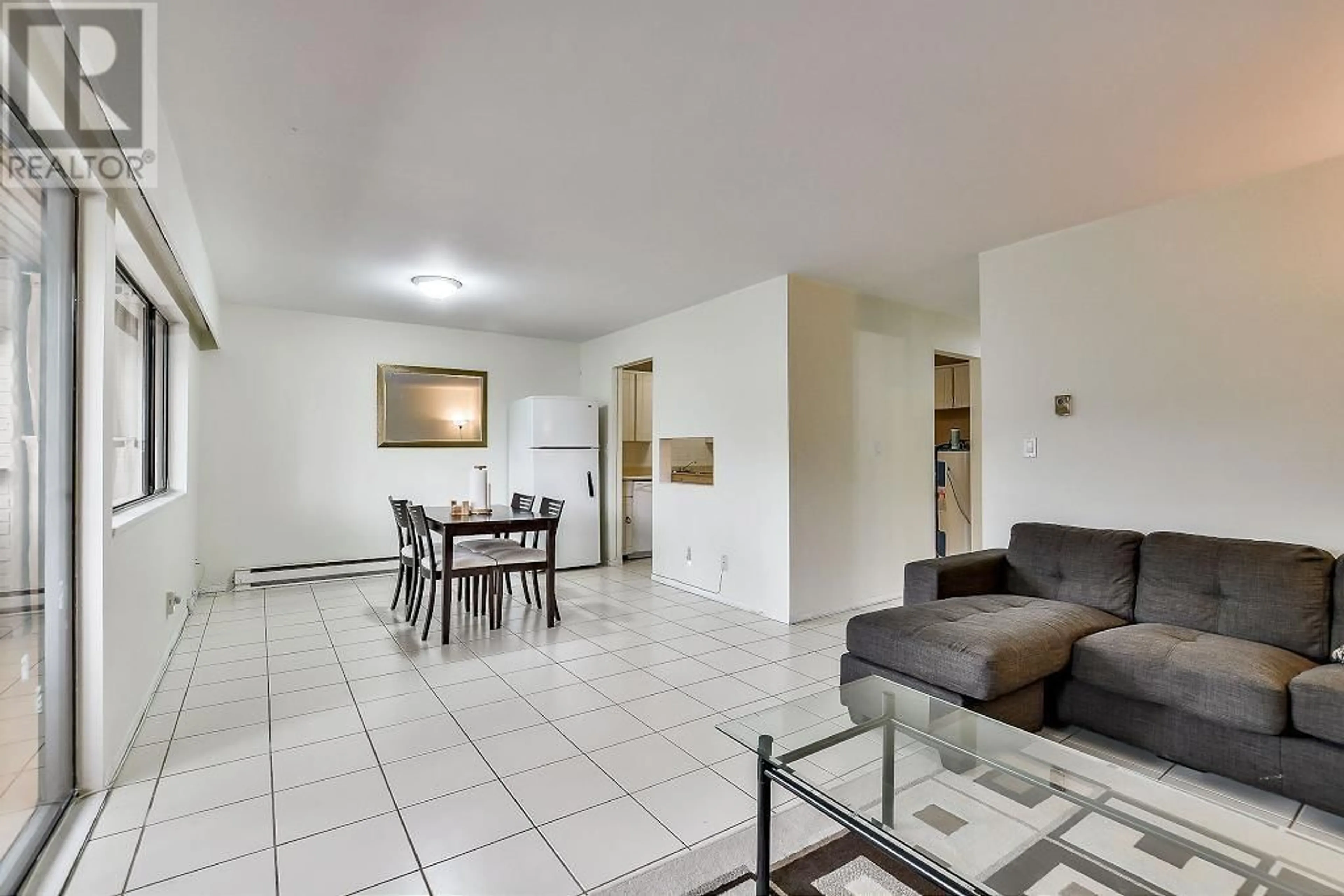 Living room with furniture, unknown for 5642 BROADWAY, Burnaby British Columbia V5B1W7