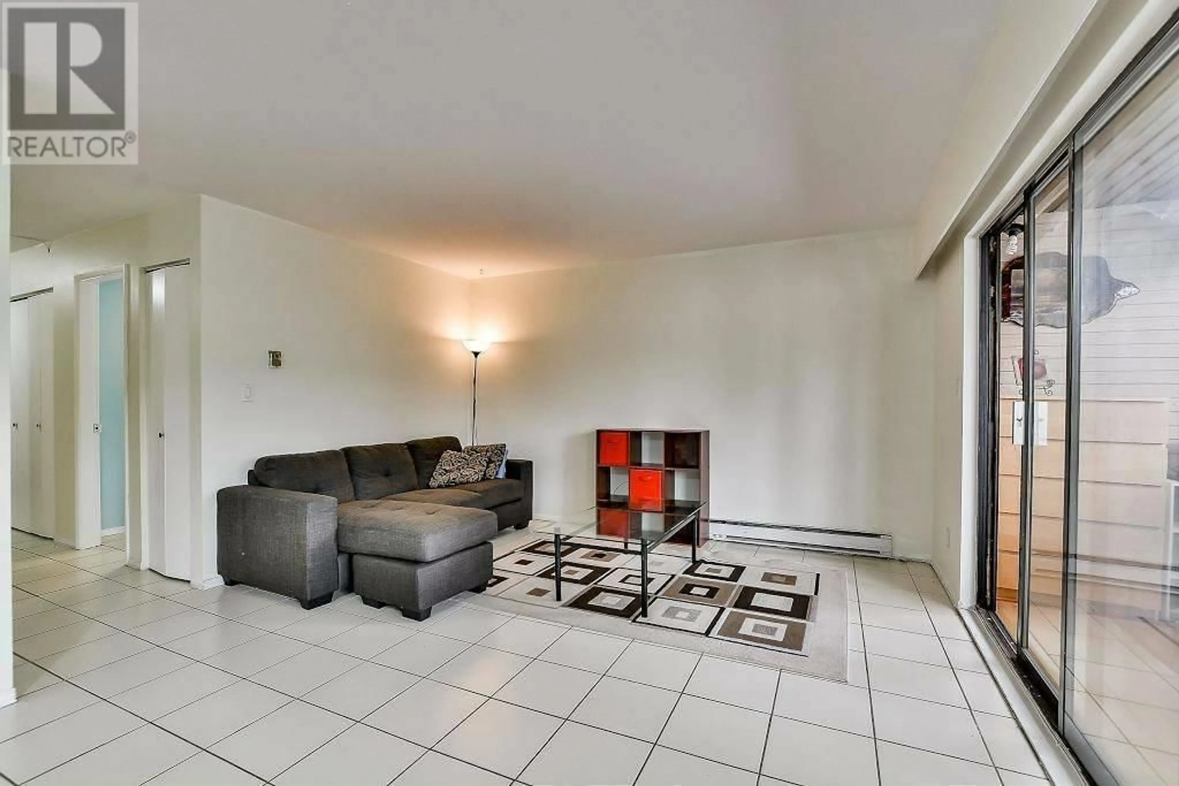 Living room with furniture, unknown for 5642 BROADWAY, Burnaby British Columbia V5B1W7