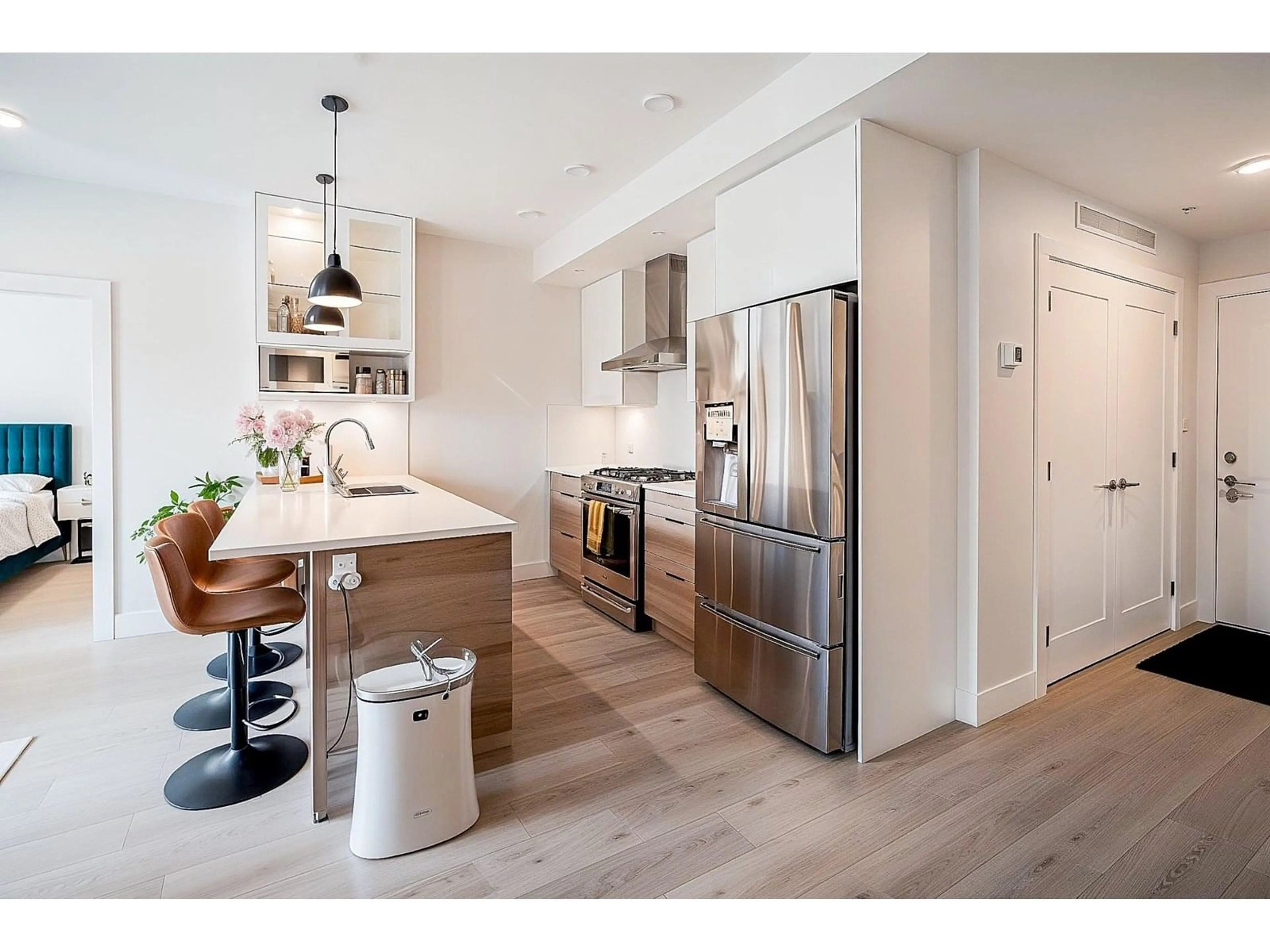 Open concept kitchen, wood/laminate floor for 208 - 14818 60, Surrey British Columbia V3S0B5