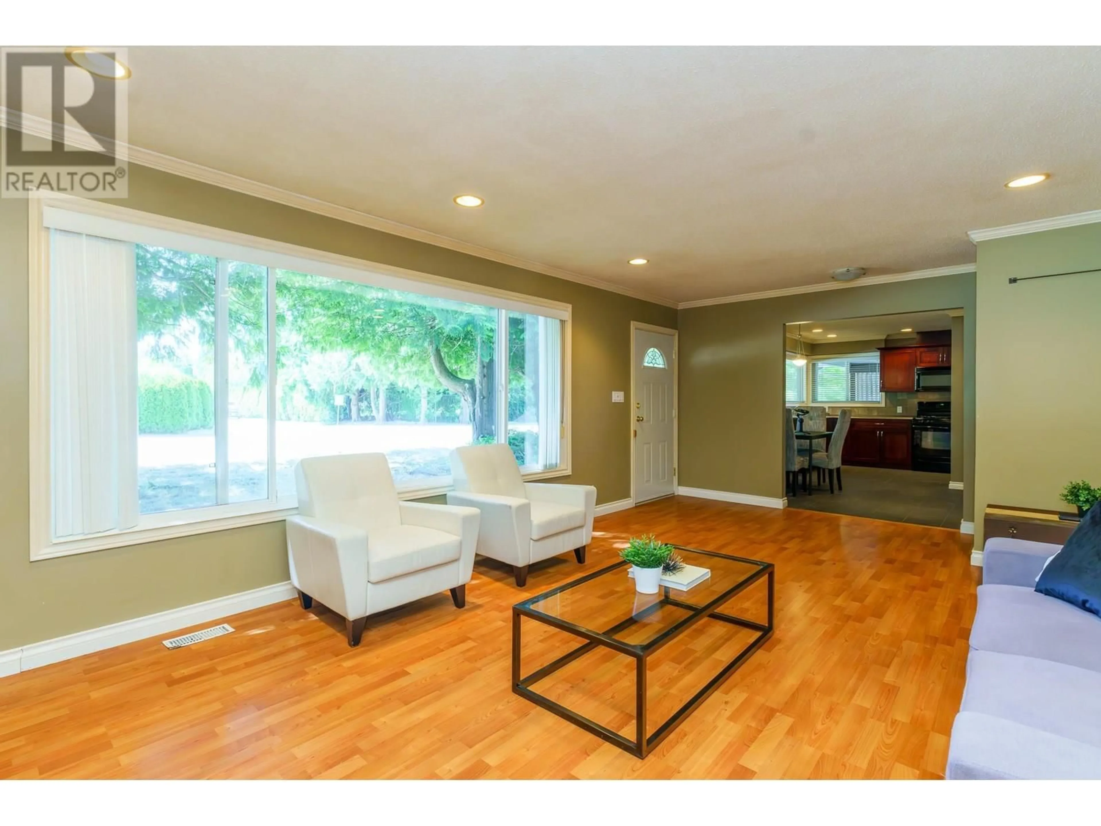Living room with furniture, wood/laminate floor for 5785 16TH AVENUE, Delta British Columbia V4L1G8