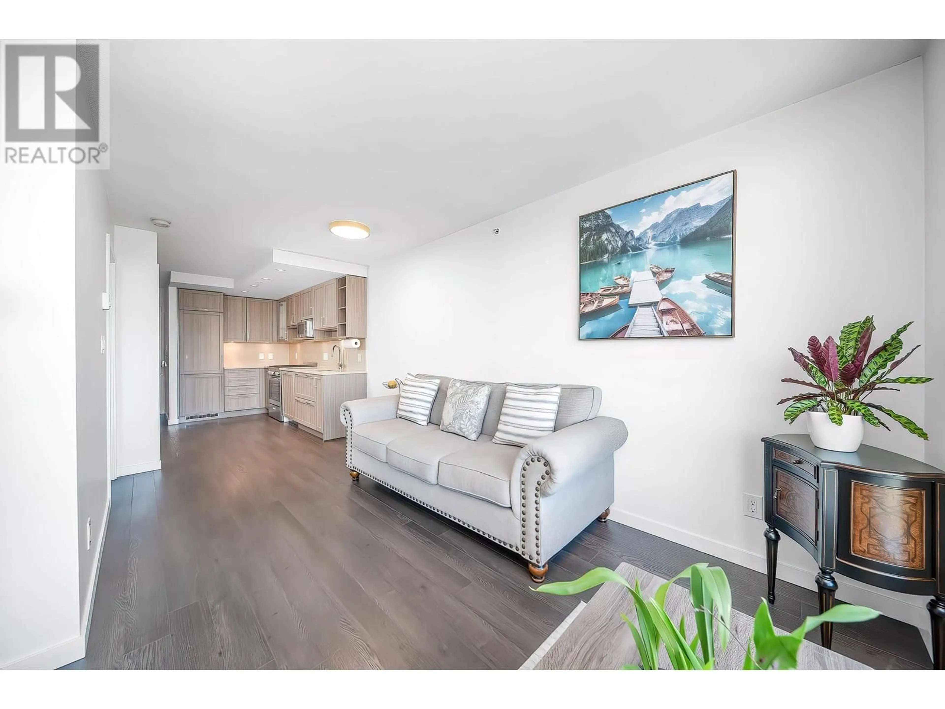 Living room with furniture, wood/laminate floor for 1703 - 5515 BOUNDARY ROAD, Vancouver British Columbia V5R0E5