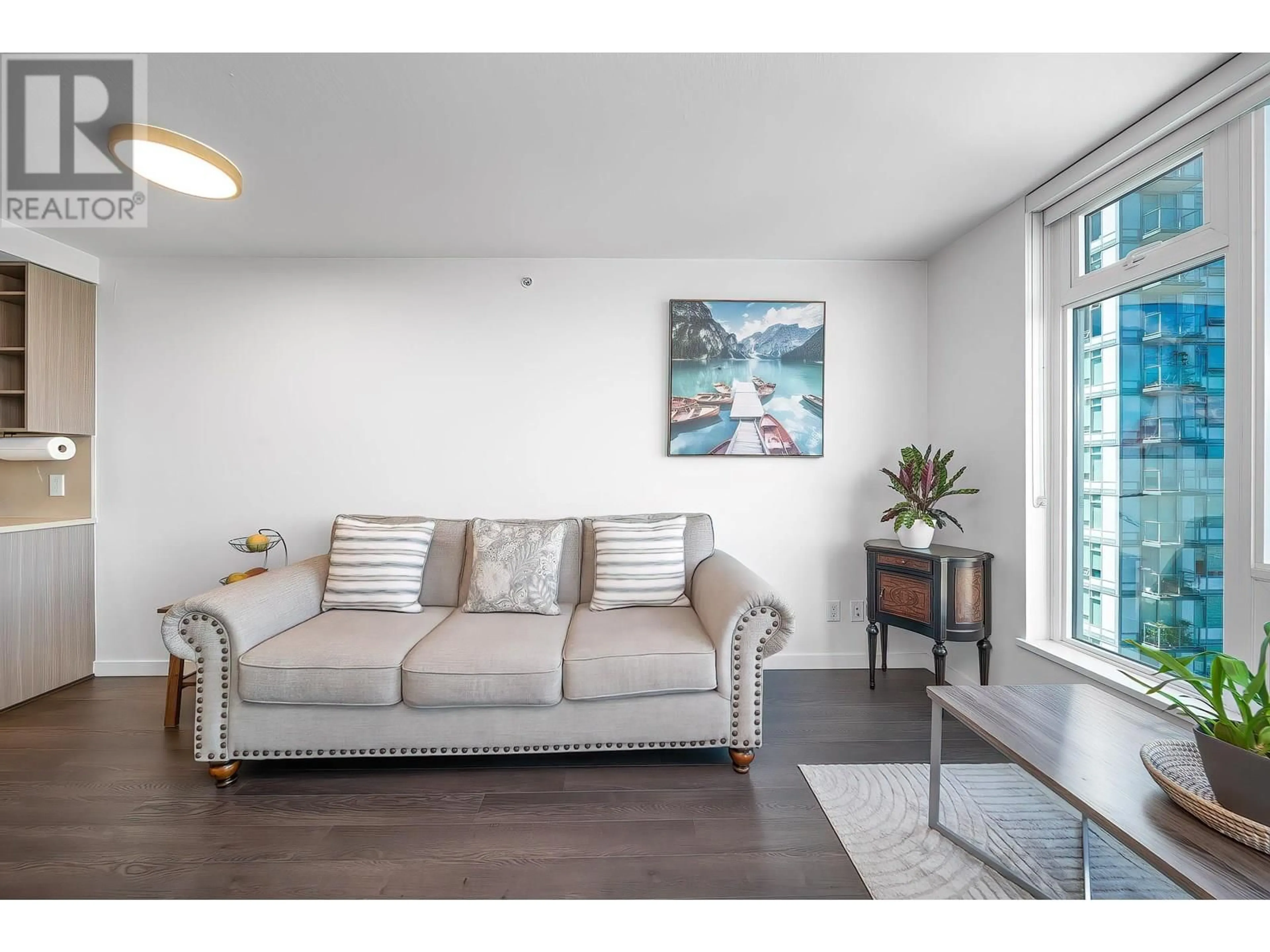 Living room with furniture, wood/laminate floor for 1703 - 5515 BOUNDARY ROAD, Vancouver British Columbia V5R0E5
