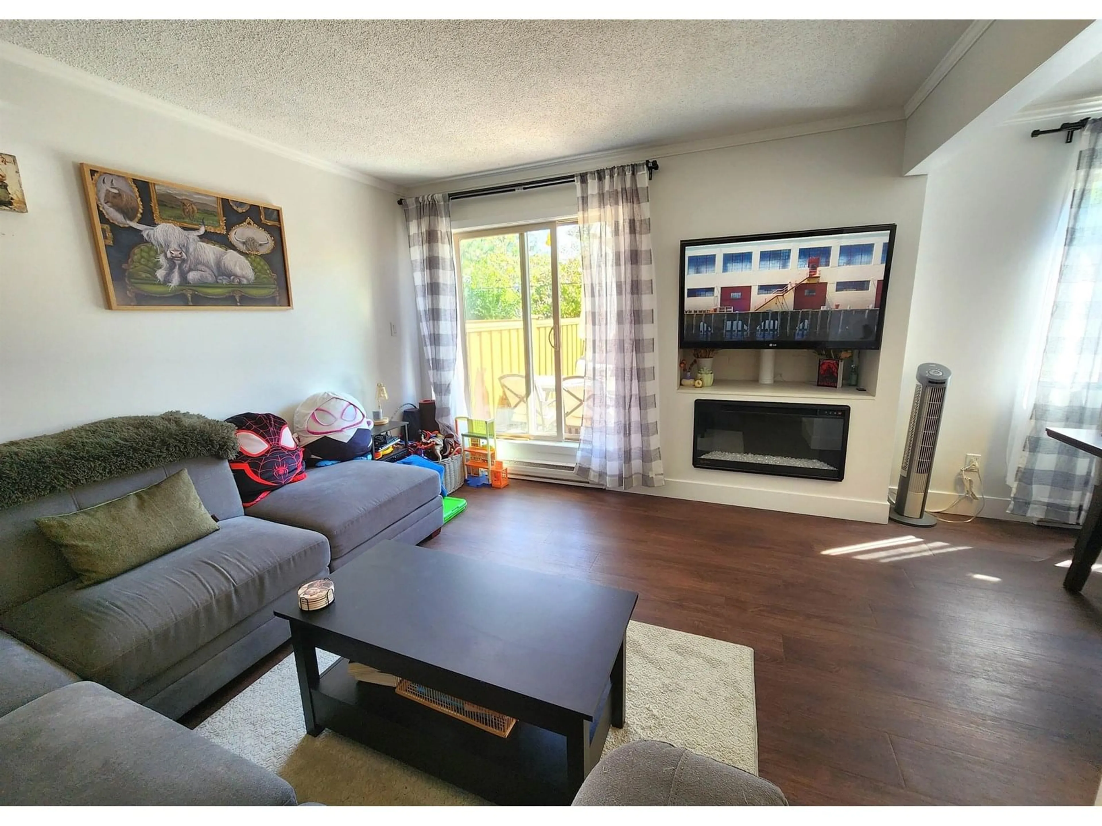Living room with furniture, wood/laminate floor for 193 - 27456 32, Langley British Columbia V4W3P3