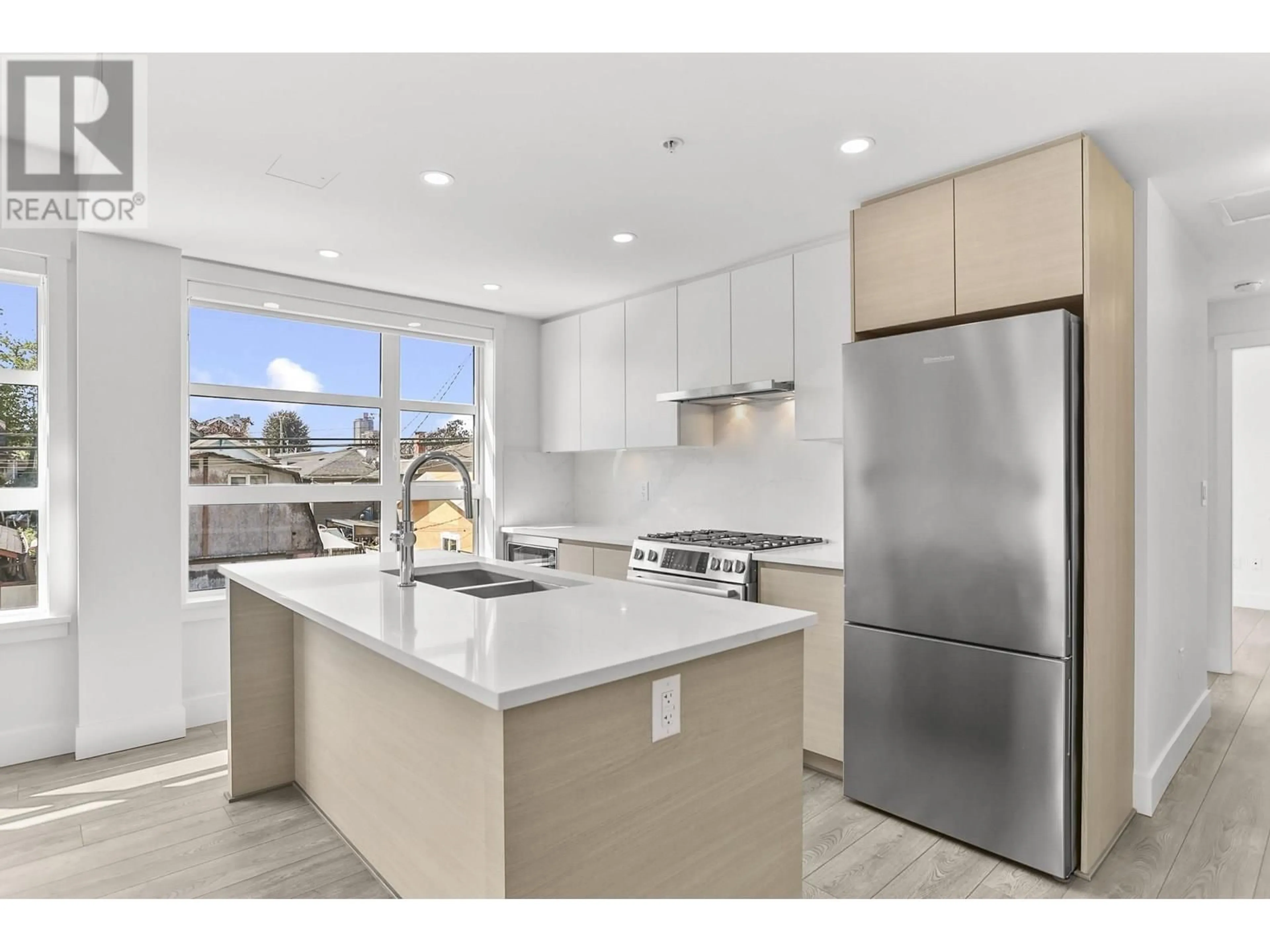 Open concept kitchen, unknown for 306 - 4788 HASTINGS STREET, Burnaby British Columbia V5C0P3