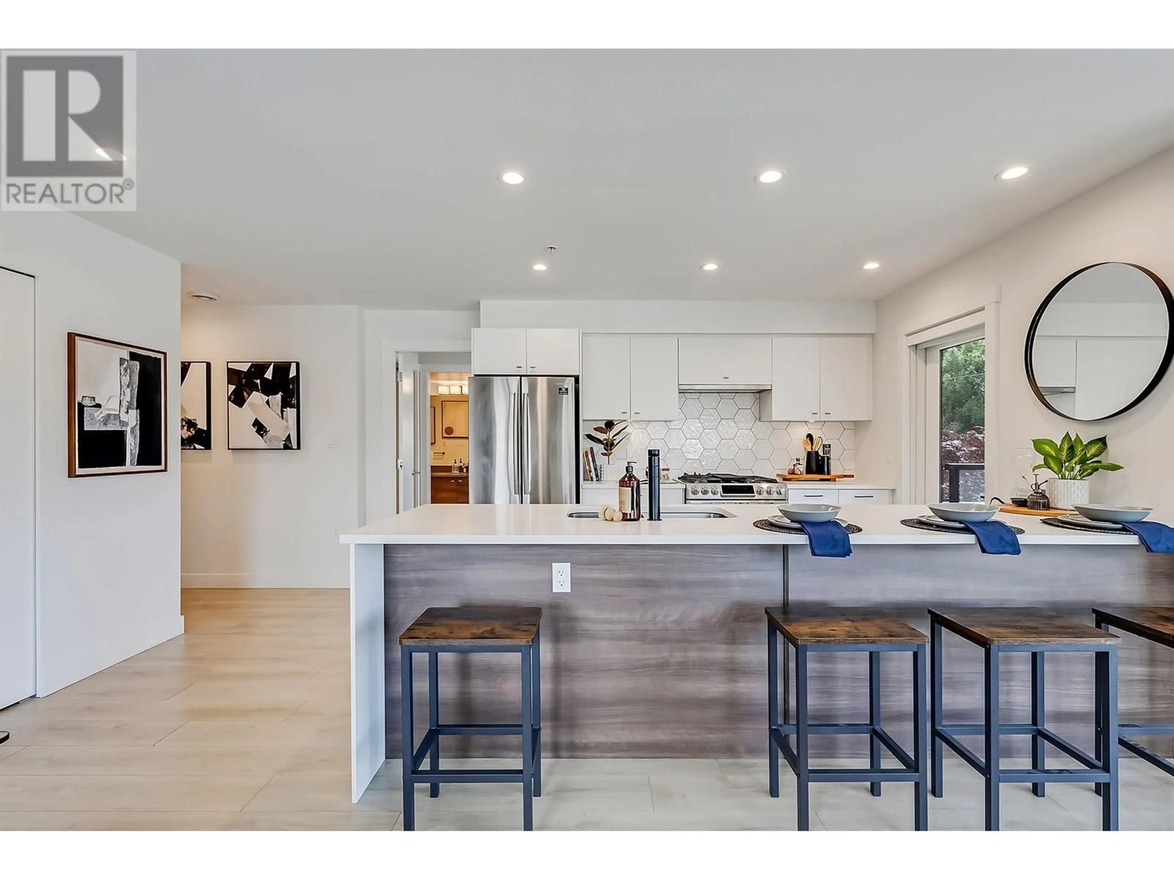 Open concept kitchen, unknown for 208 - 1519 CROWN STREET, North Vancouver British Columbia V7J1G6
