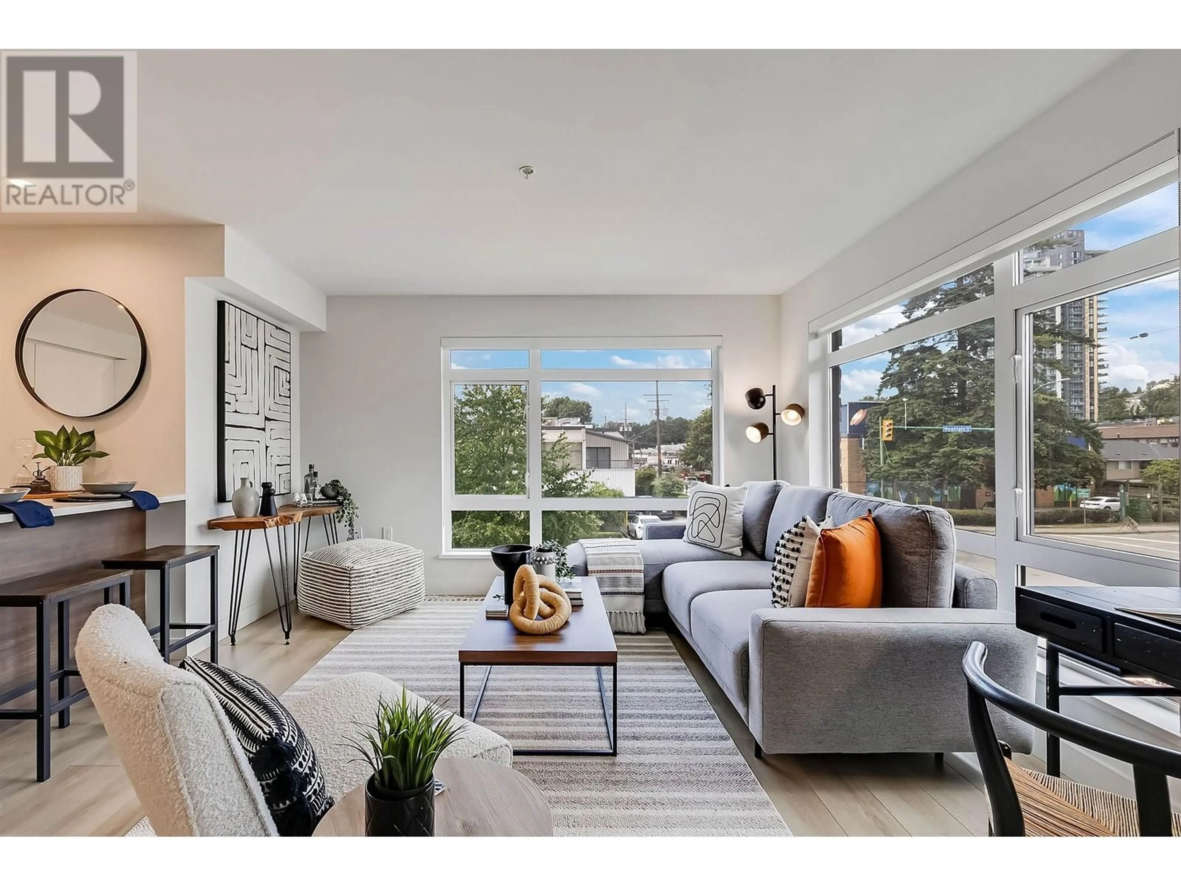 Living room with furniture, unknown for 208 - 1519 CROWN STREET, North Vancouver British Columbia V7J1G6