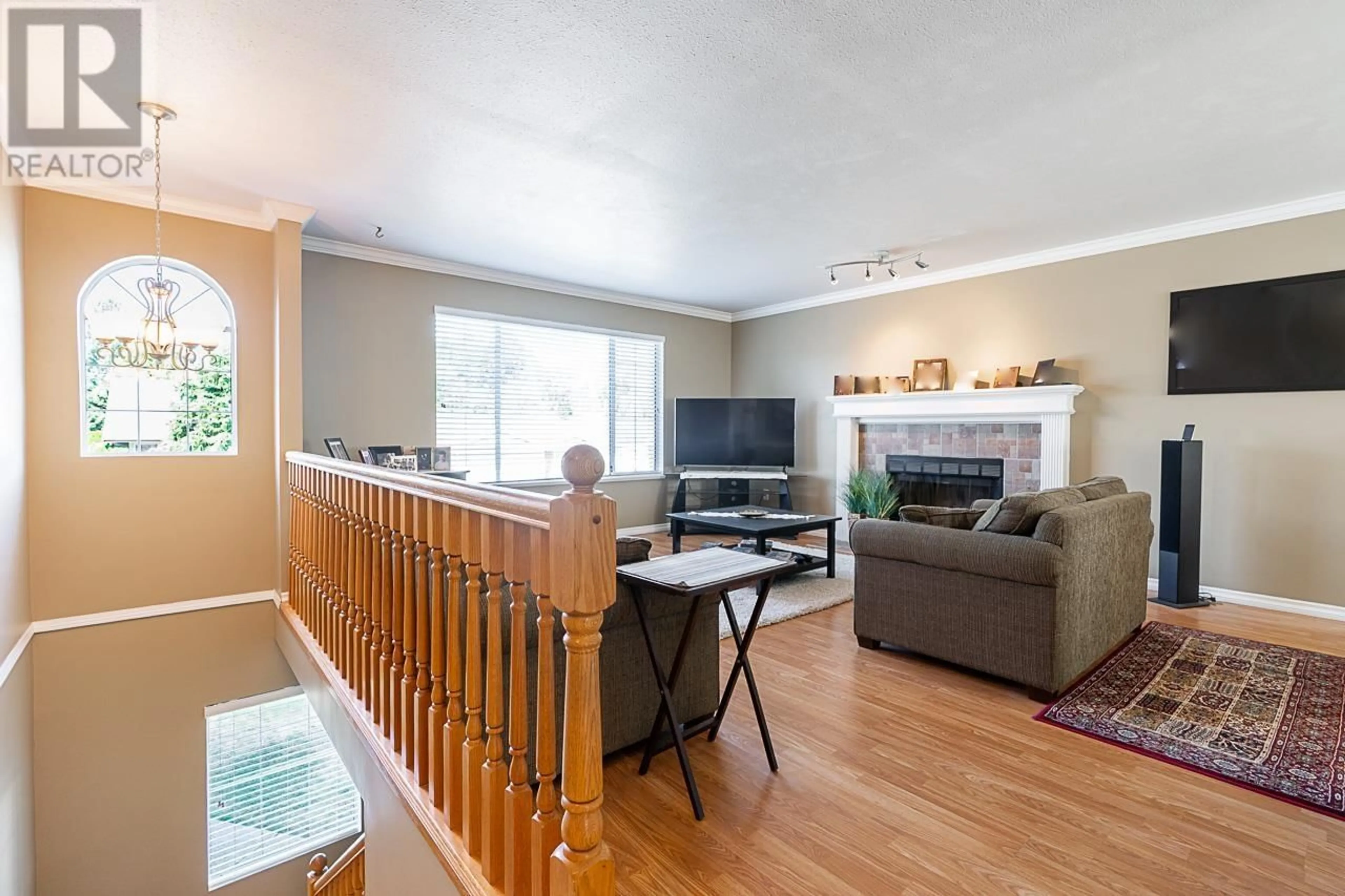Living room with furniture, wood/laminate floor for 11908 237A STREET, Maple Ridge British Columbia V4R1V9