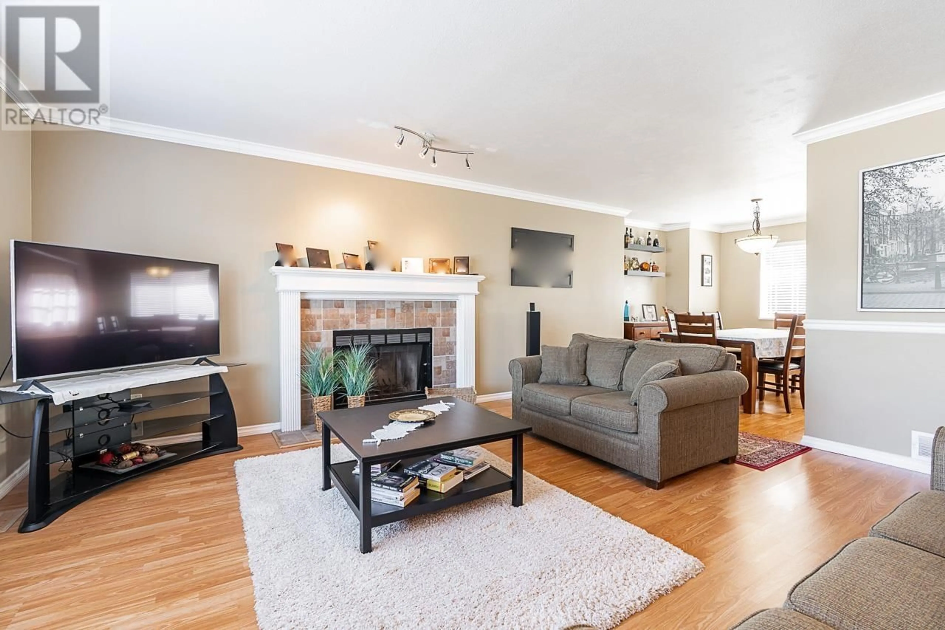Living room with furniture, wood/laminate floor for 11908 237A STREET, Maple Ridge British Columbia V4R1V9