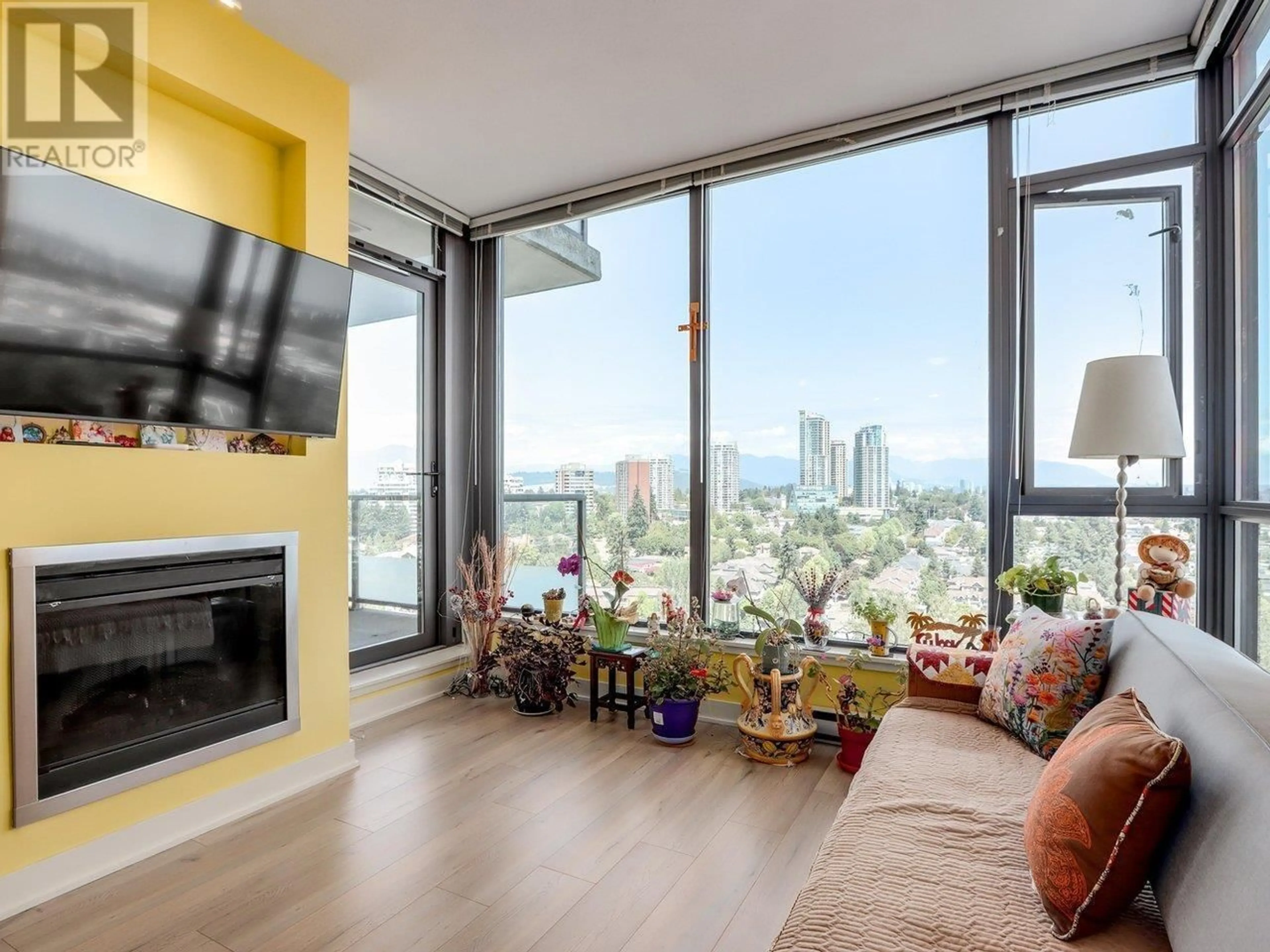 Living room with furniture, wood/laminate floor for 2206 - 7088 18TH AVENUE, Burnaby British Columbia V3N0A2