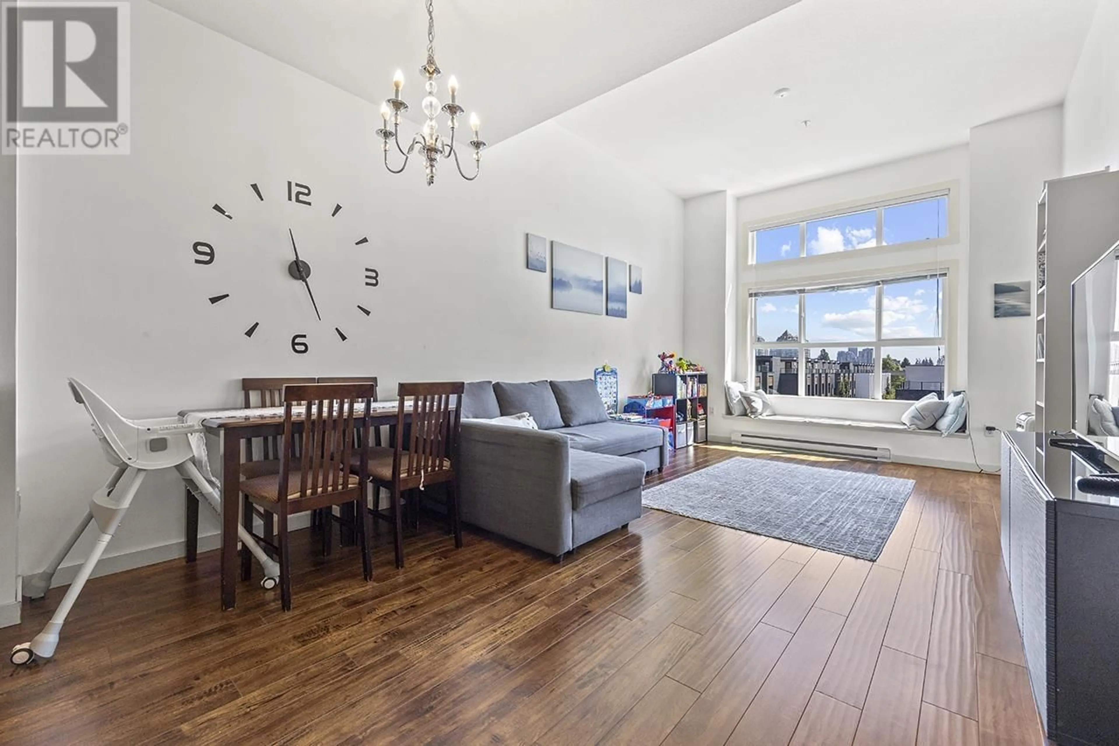 Living room with furniture, wood/laminate floor for 411 - 5889 IRMIN STREET, Burnaby British Columbia V5J0C1