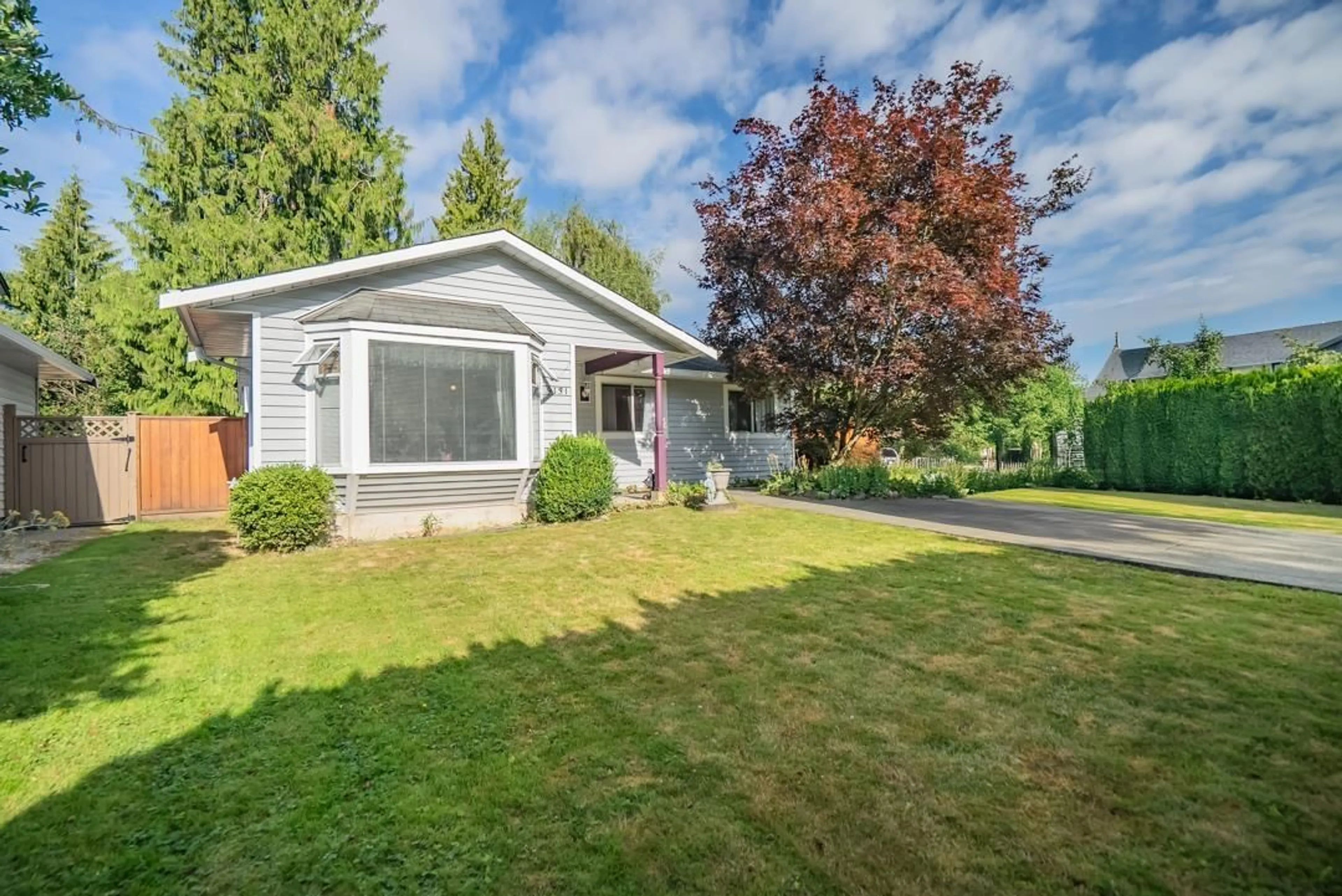 Home with vinyl exterior material, street for 9131 212A, Langley British Columbia V1M1K1