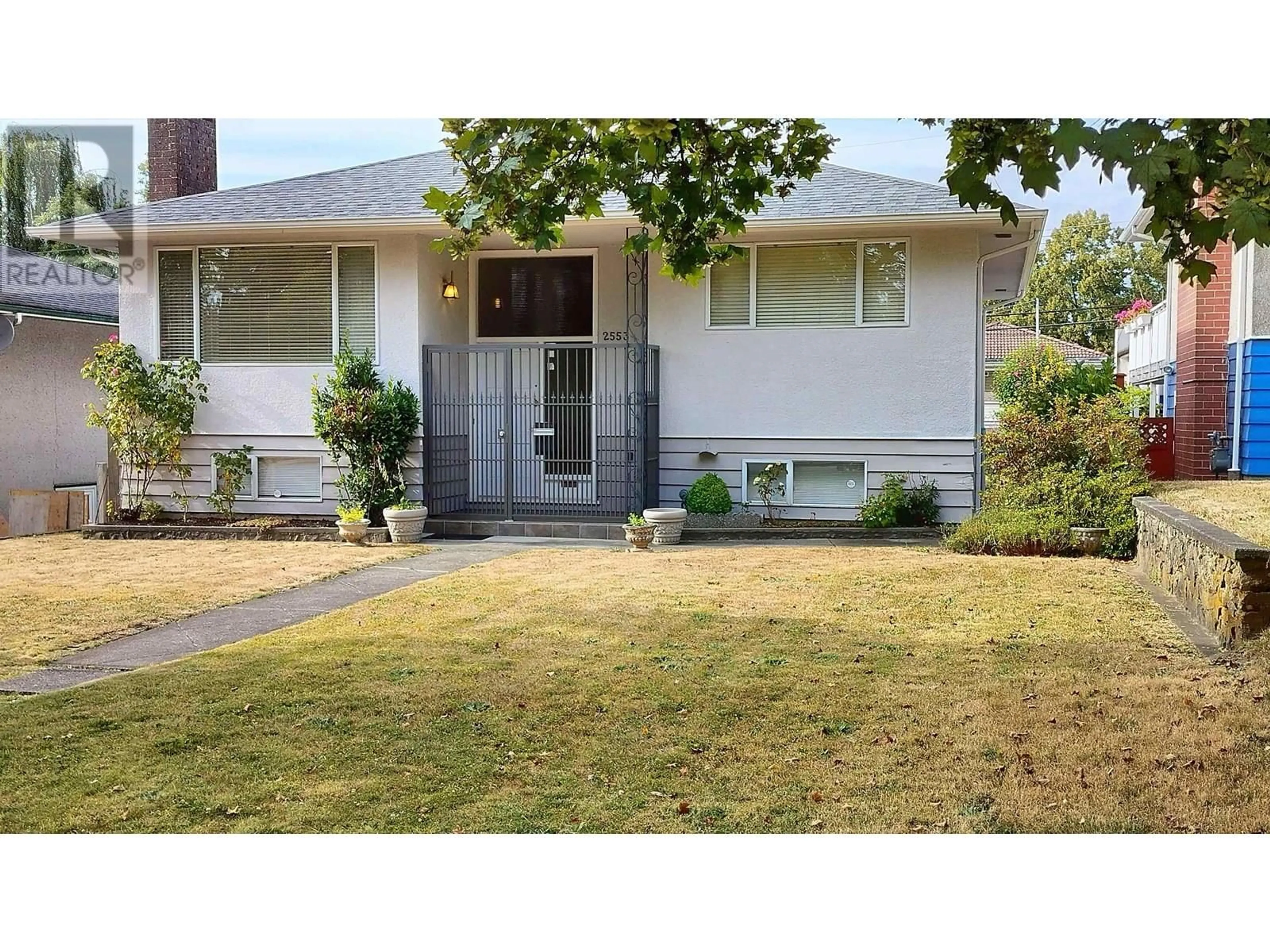 Home with vinyl exterior material, street for 2553 20TH AVENUE, Vancouver British Columbia V5M2T5
