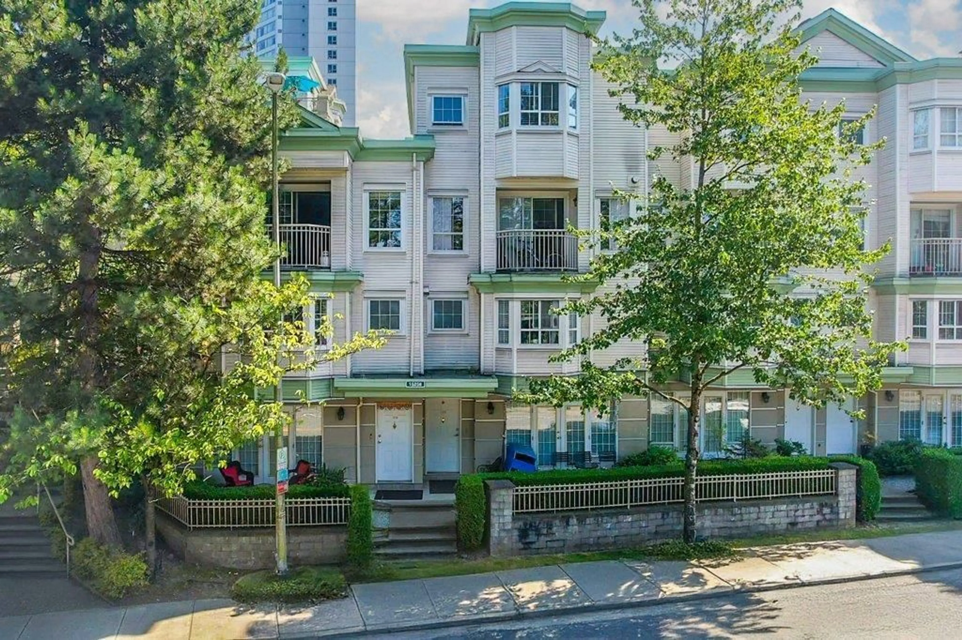 A pic from outside/outdoor area/front of a property/back of a property/a pic from drone, city buildings view from balcony for 106 - 15258 105, Surrey British Columbia V3R0W8