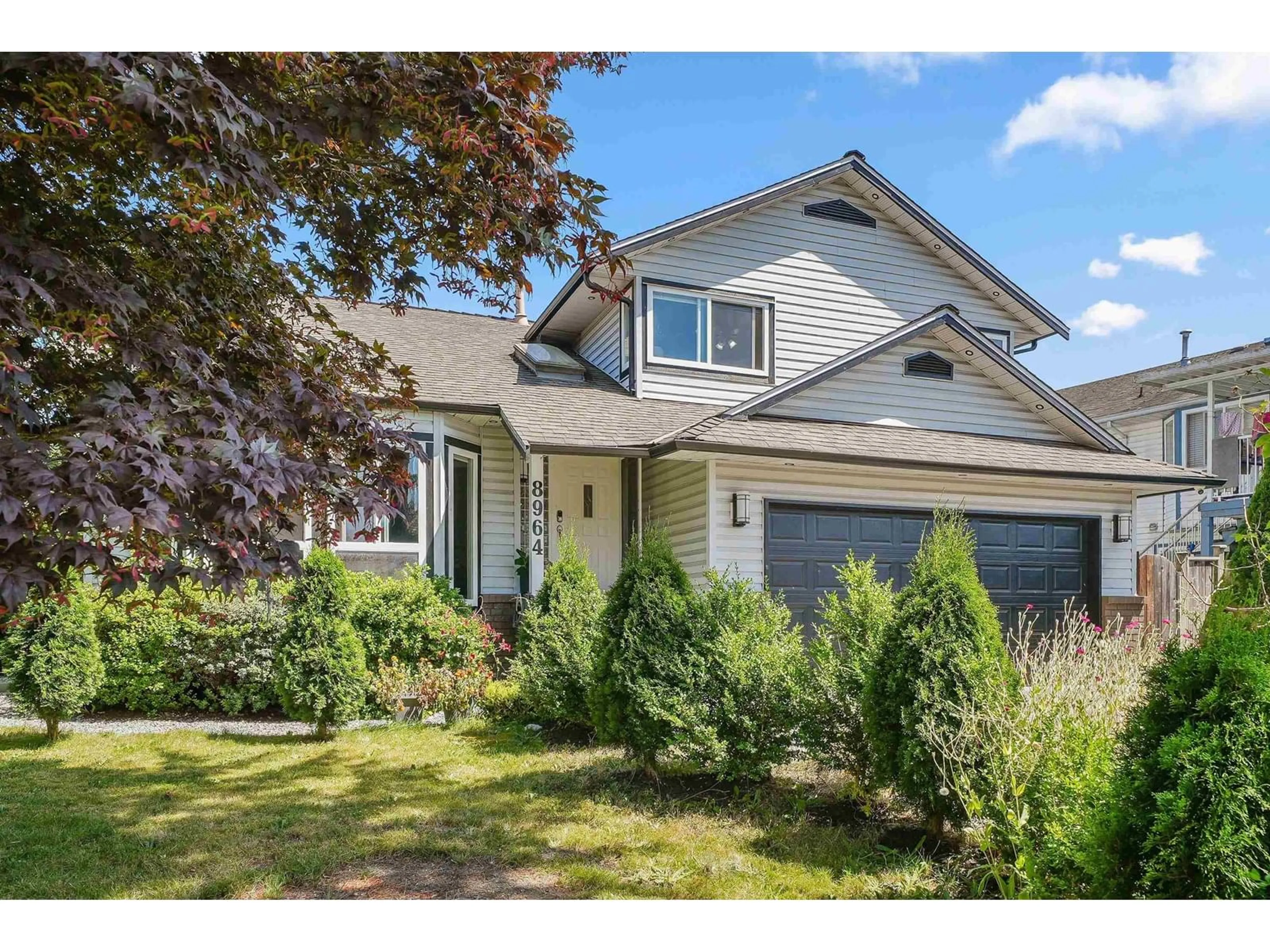 Home with vinyl exterior material, street for 8964 142A, Surrey British Columbia V3V7T1