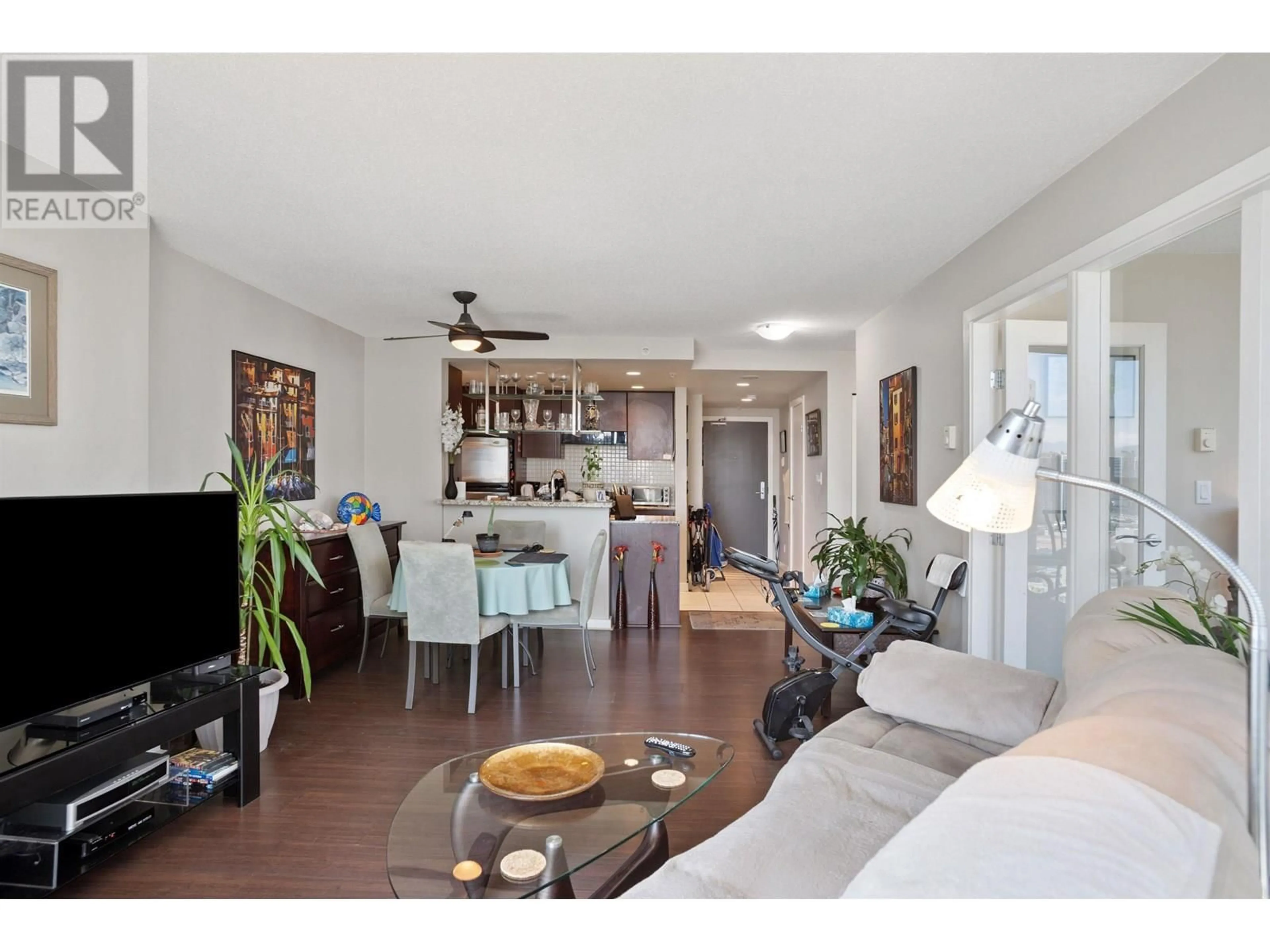 Living room with furniture, wood/laminate floor for 2307 - 455 BEACH CRESCENT, Vancouver British Columbia V6Z3E5