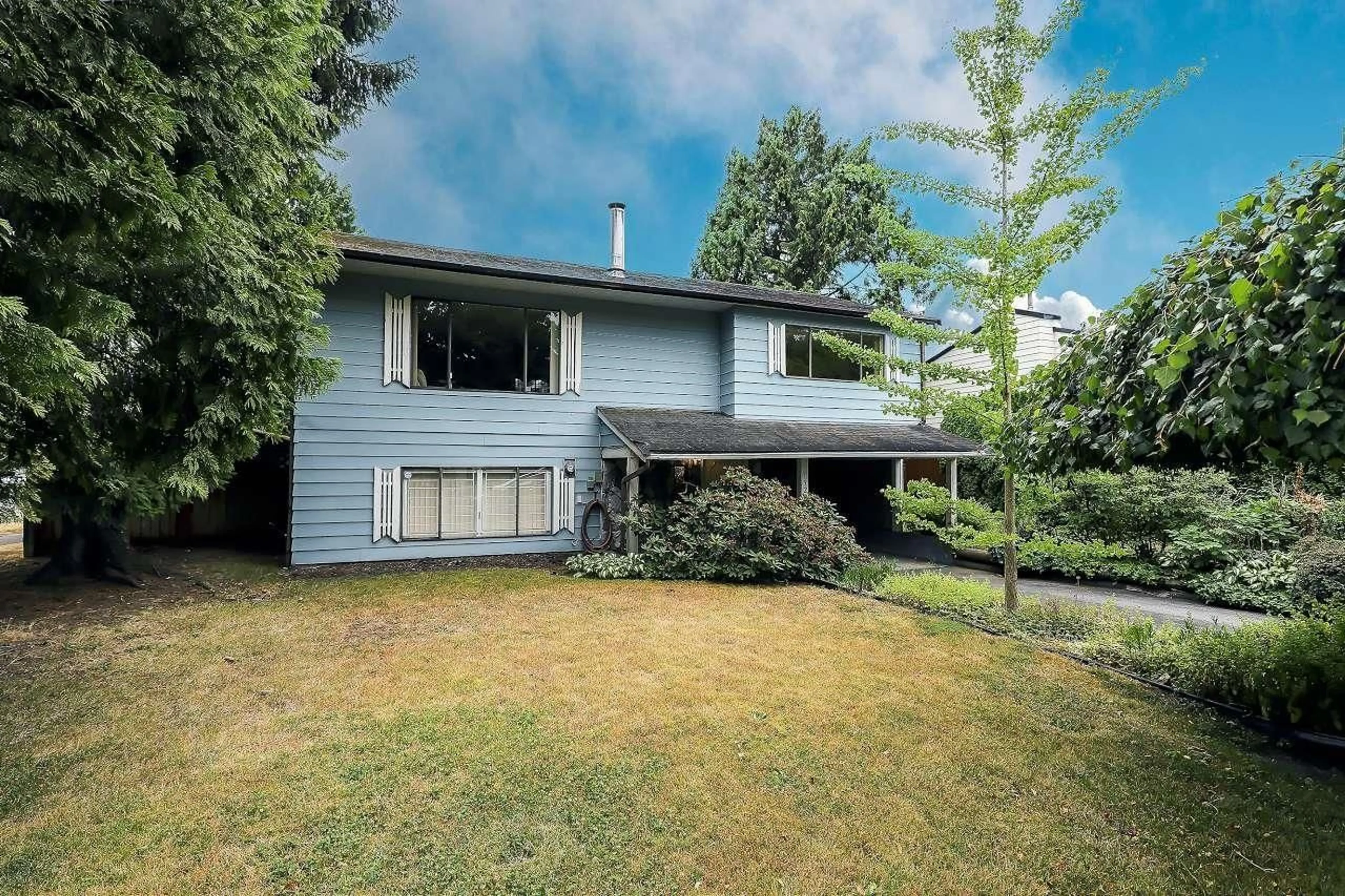 Home with vinyl exterior material, street for 13290 94, Surrey British Columbia V3V6W8