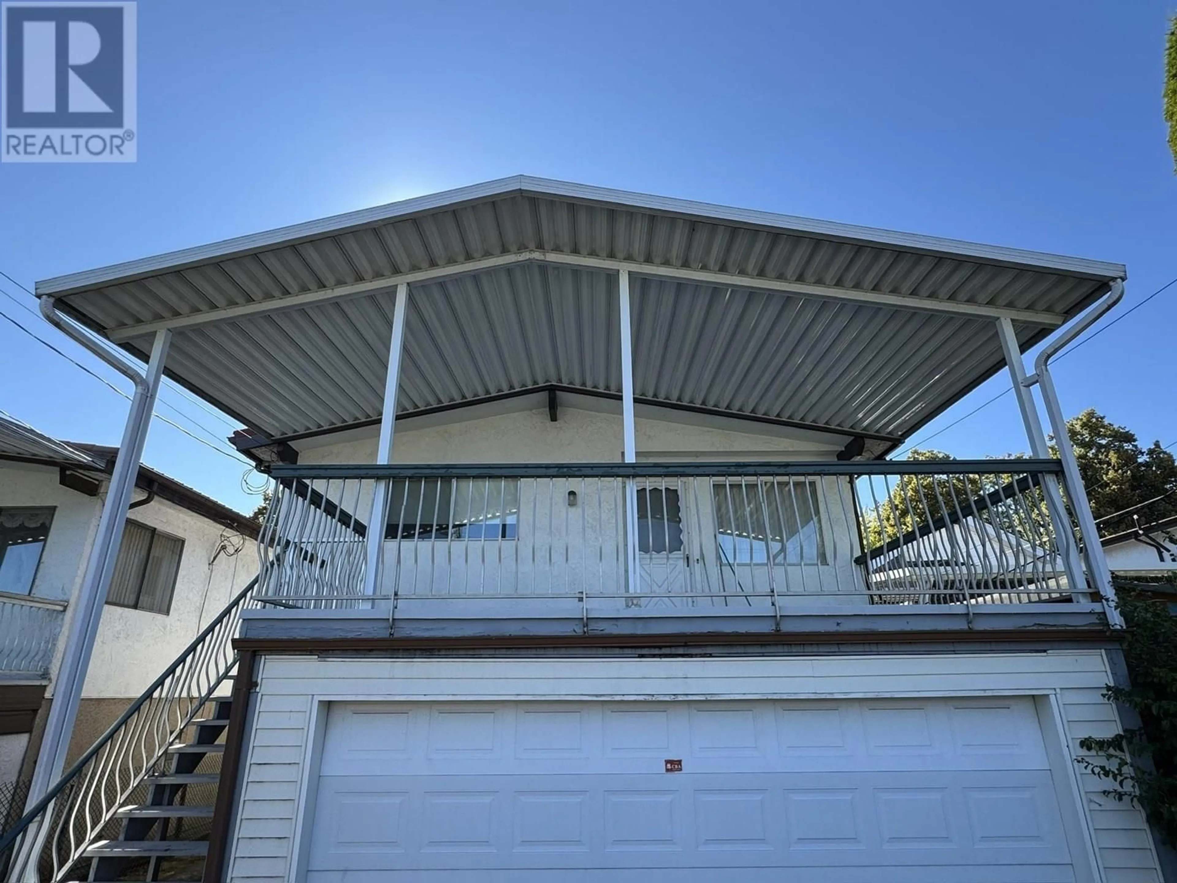 Home with vinyl exterior material, street for 5770 SHERBROOKE STREET, Vancouver British Columbia V5W3M9