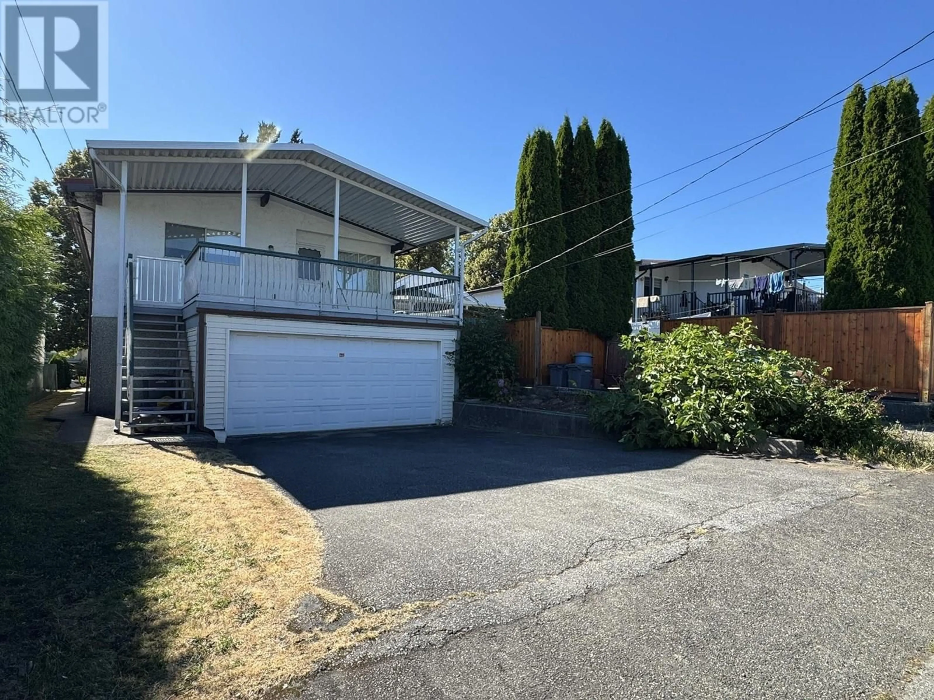 A pic from outside/outdoor area/front of a property/back of a property/a pic from drone, street for 5770 SHERBROOKE STREET, Vancouver British Columbia V5W3M9