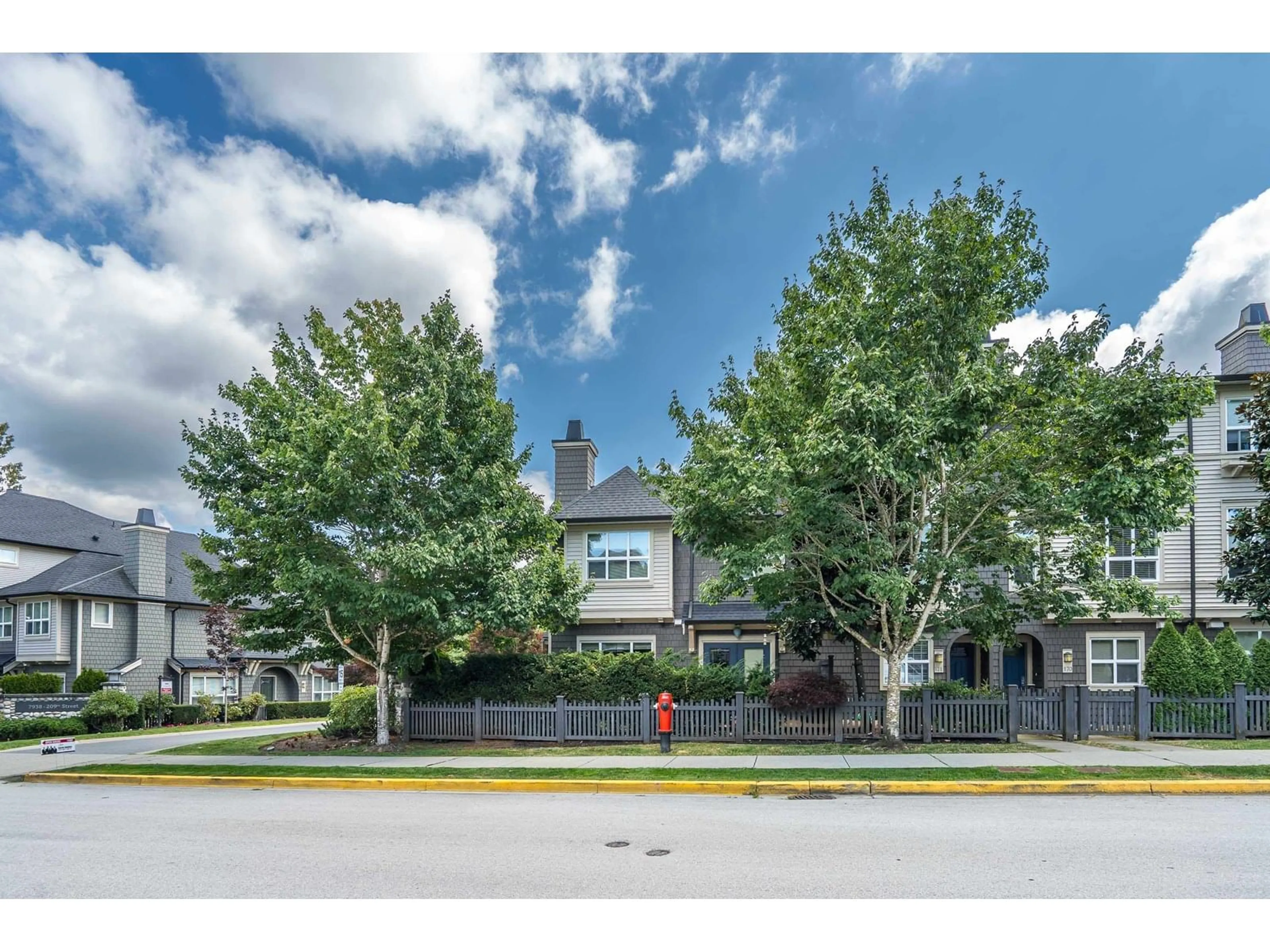 A pic from outside/outdoor area/front of a property/back of a property/a pic from drone, street for 170 - 7938 209, Langley British Columbia V2Y0K1