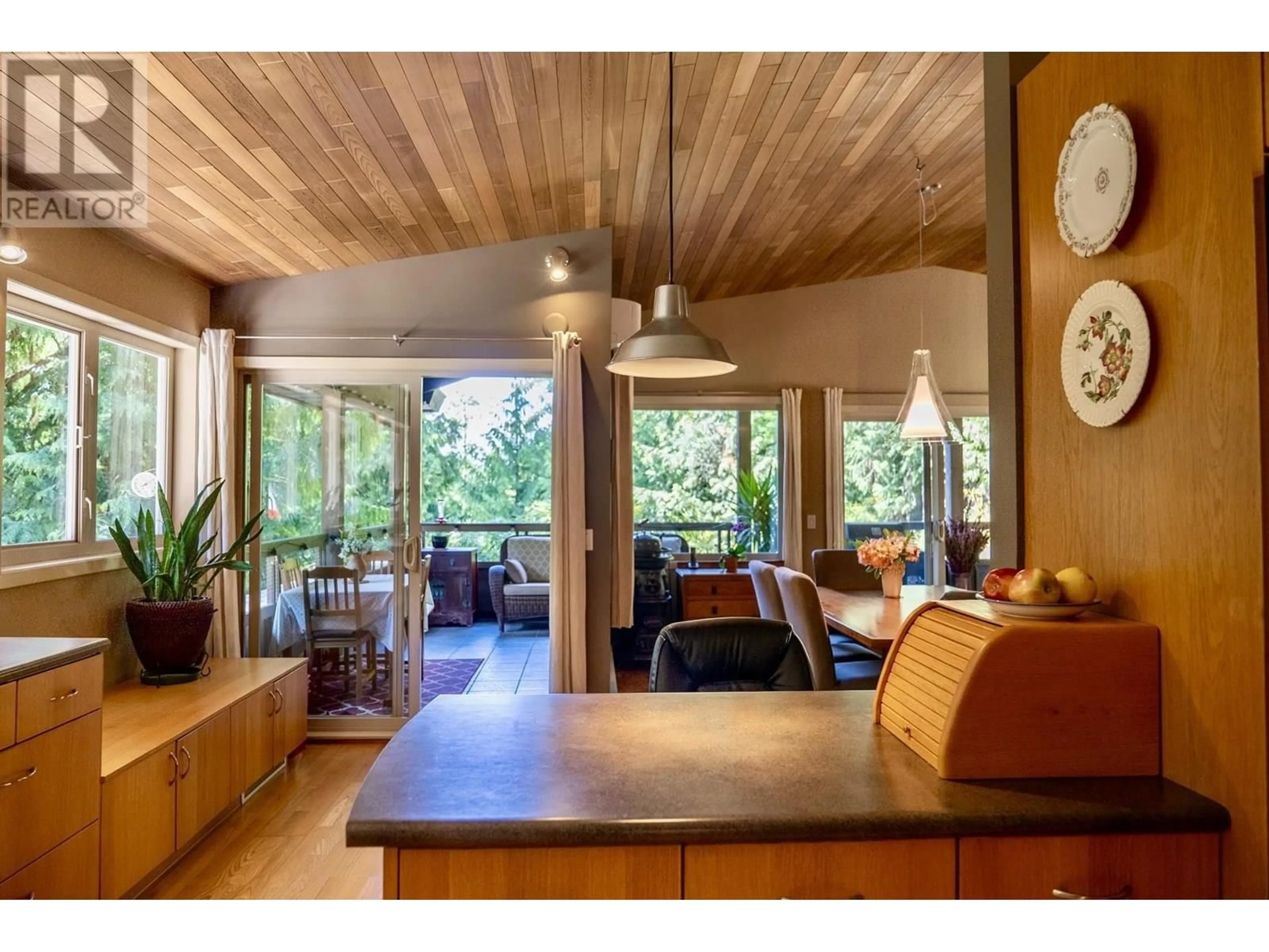 Open concept kitchen, wood/laminate floor for 2616 CROWSNEST DRIVE, Pender Island British Columbia V0N2M2