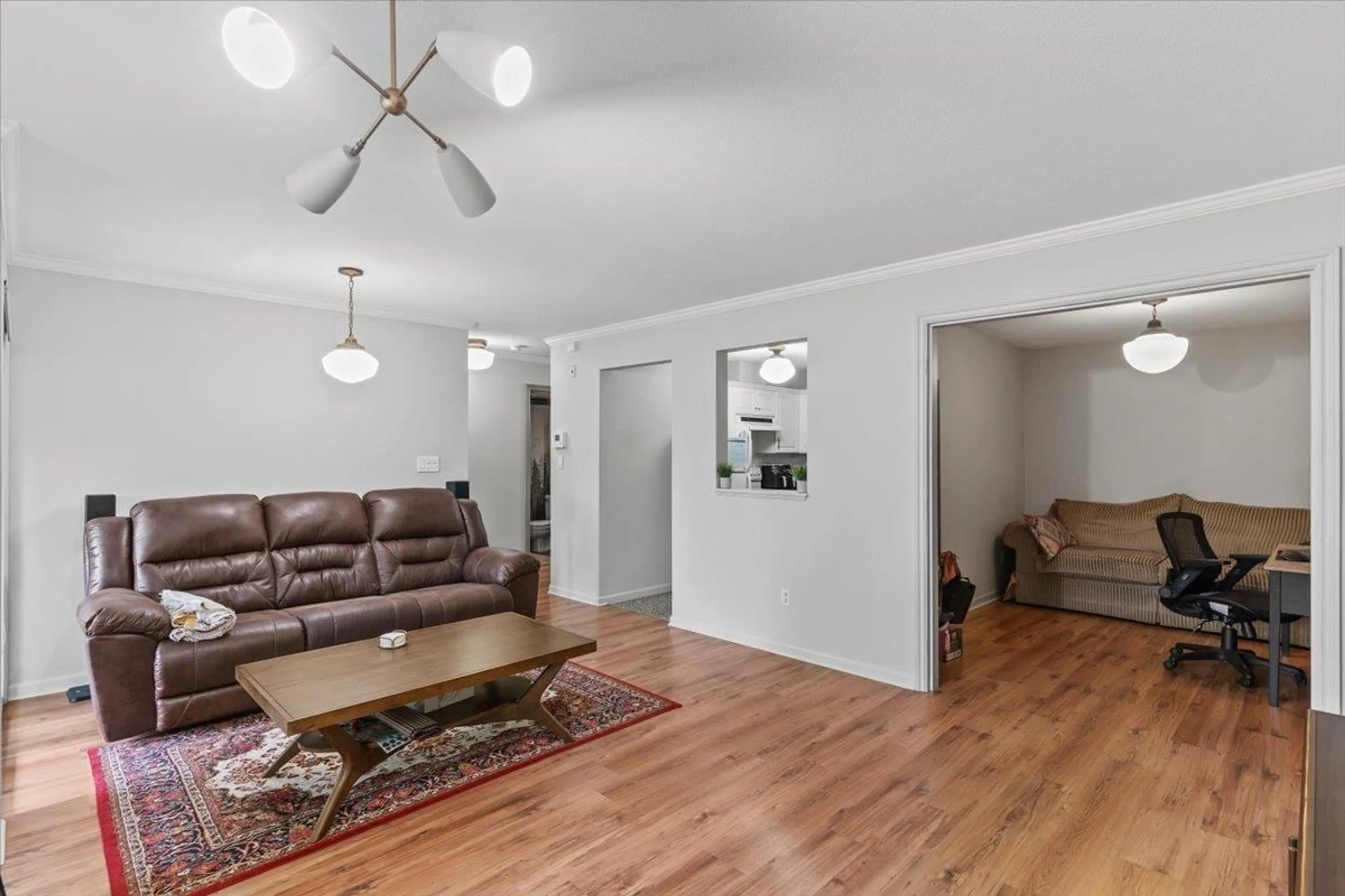 Living room with furniture, wood/laminate floor for 113 - 33150 4TH, Mission British Columbia V2V7A3
