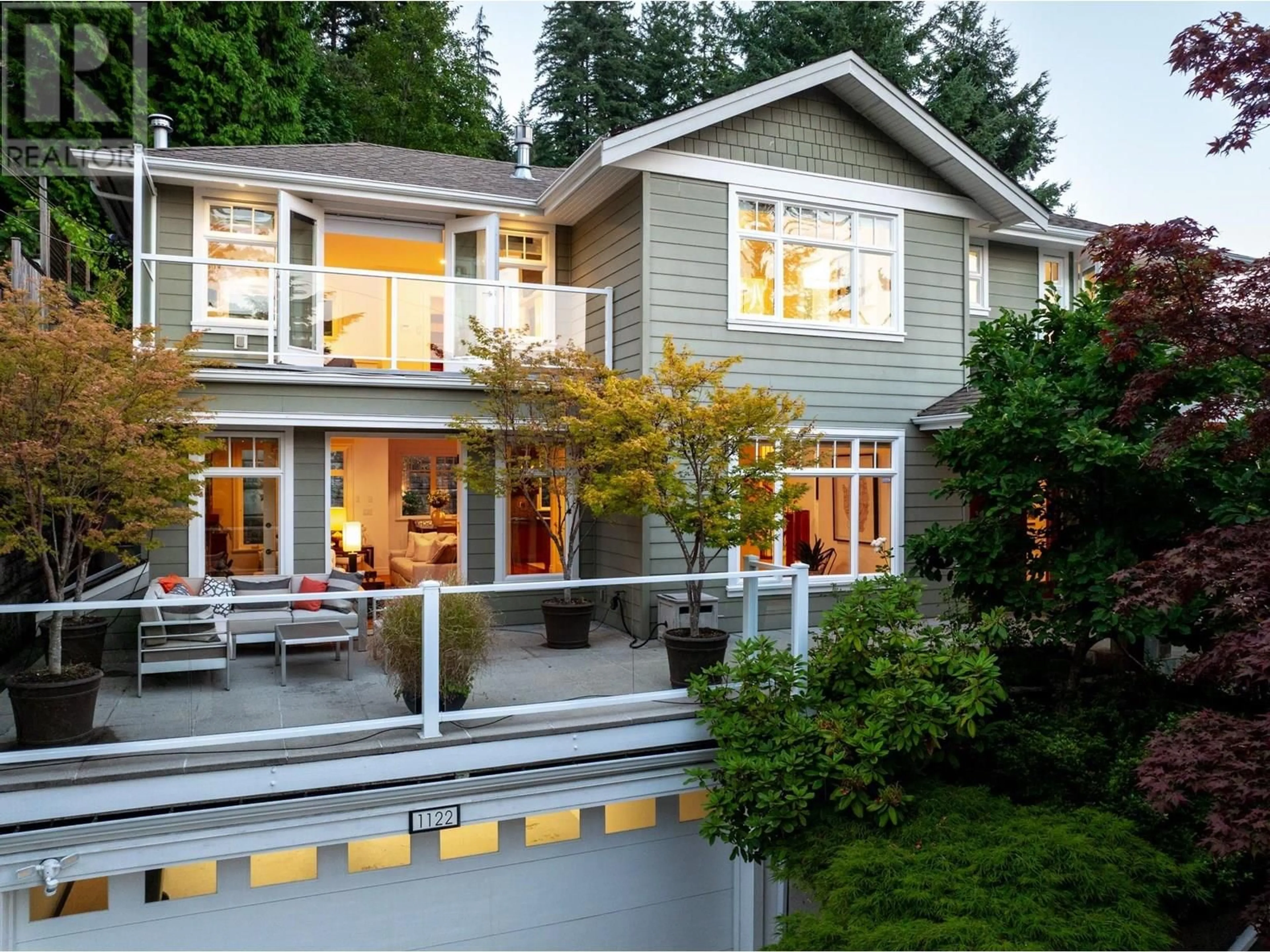 Home with vinyl exterior material, street for 1122 KILMER ROAD, North Vancouver British Columbia V7K1R1