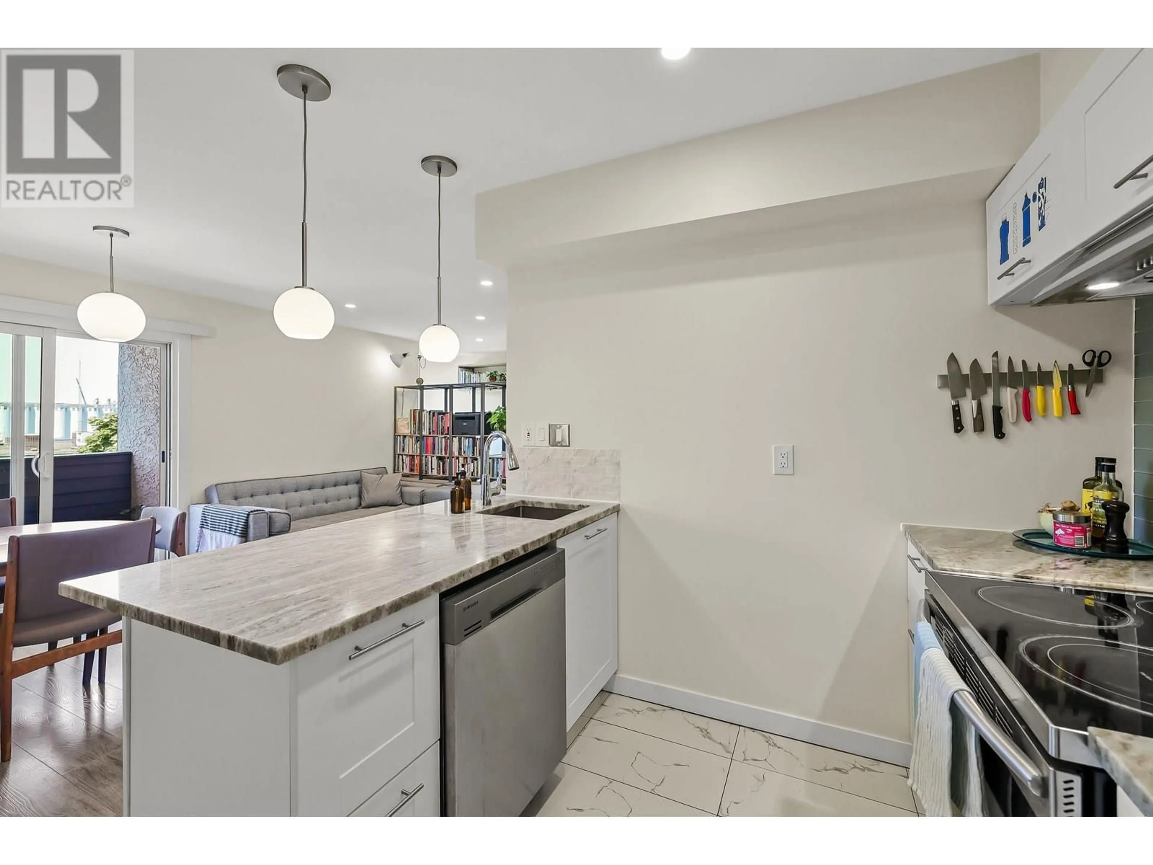 Open concept kitchen, ceramic/tile floor for 401 - 16 LAKEWOOD DRIVE, Vancouver British Columbia V5L4L1