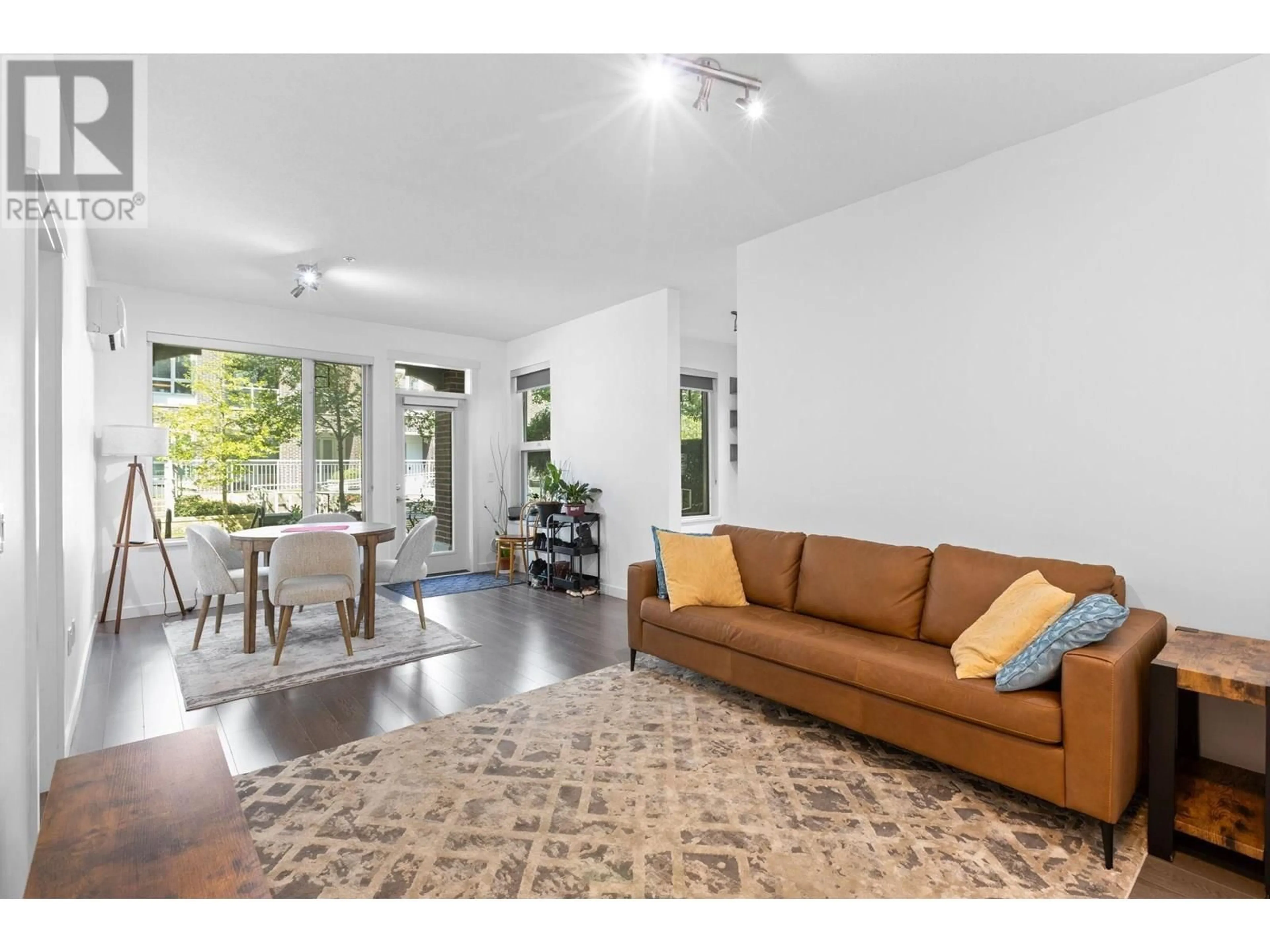 Living room with furniture, unknown for 130 - 9399 ODLIN ROAD, Richmond British Columbia V6X0J6