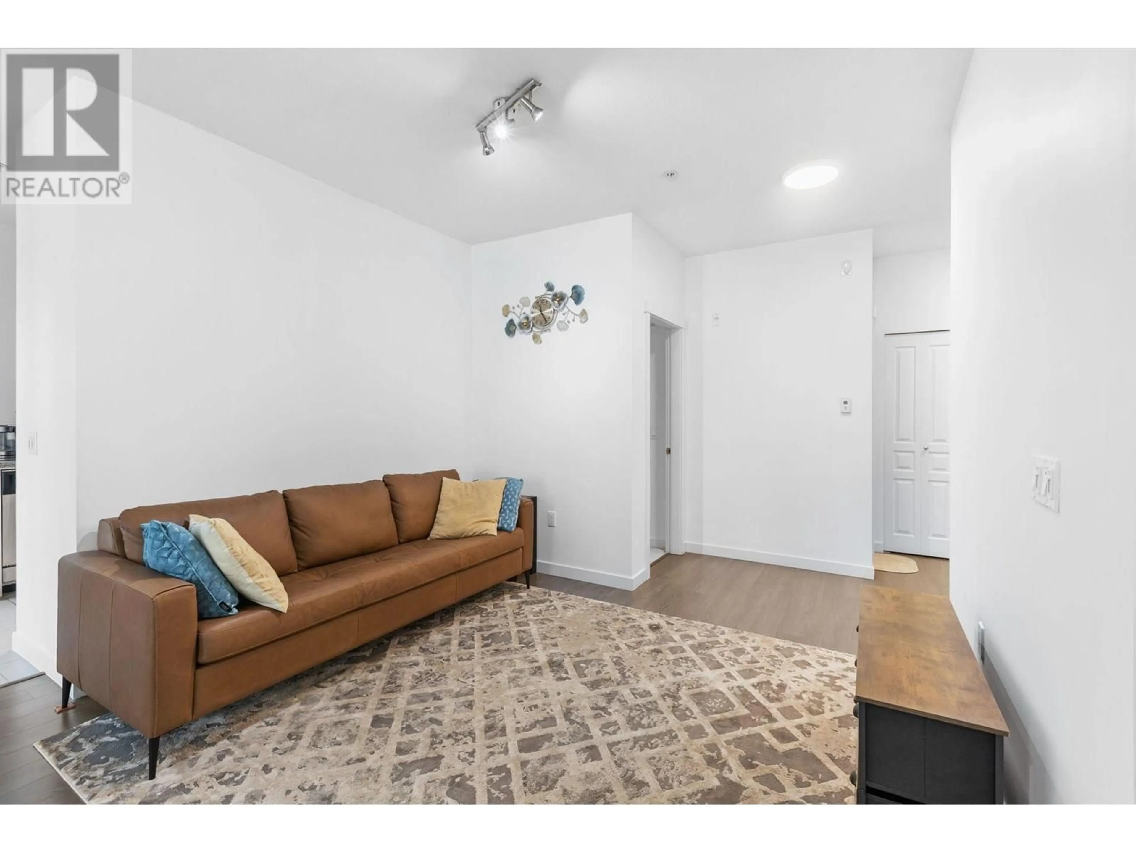 Living room with furniture, unknown for 130 - 9399 ODLIN ROAD, Richmond British Columbia V6X0J6