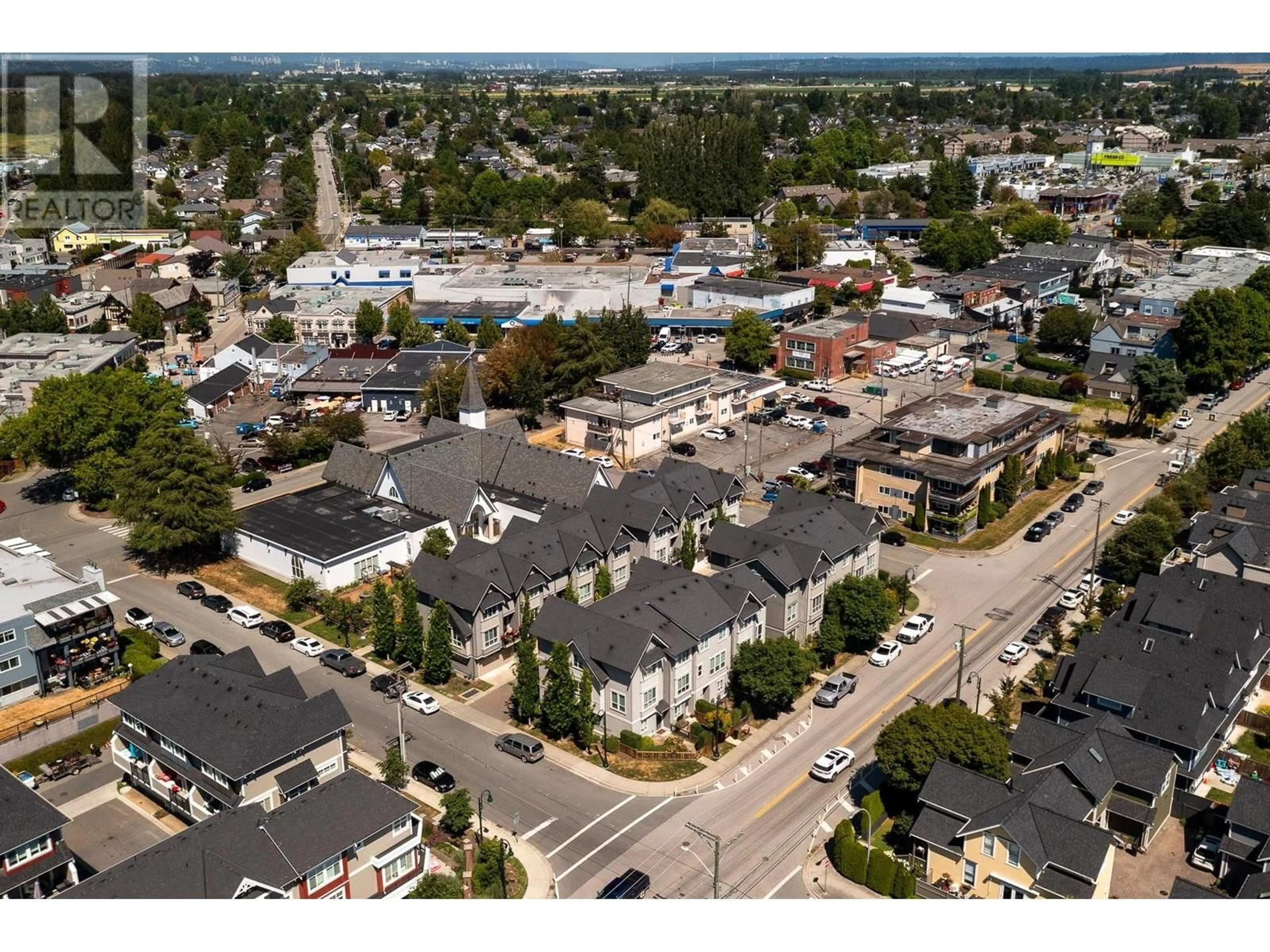 A pic from outside/outdoor area/front of a property/back of a property/a pic from drone, street for 14 - 4949 47A AVENUE, Delta British Columbia V4K1T6