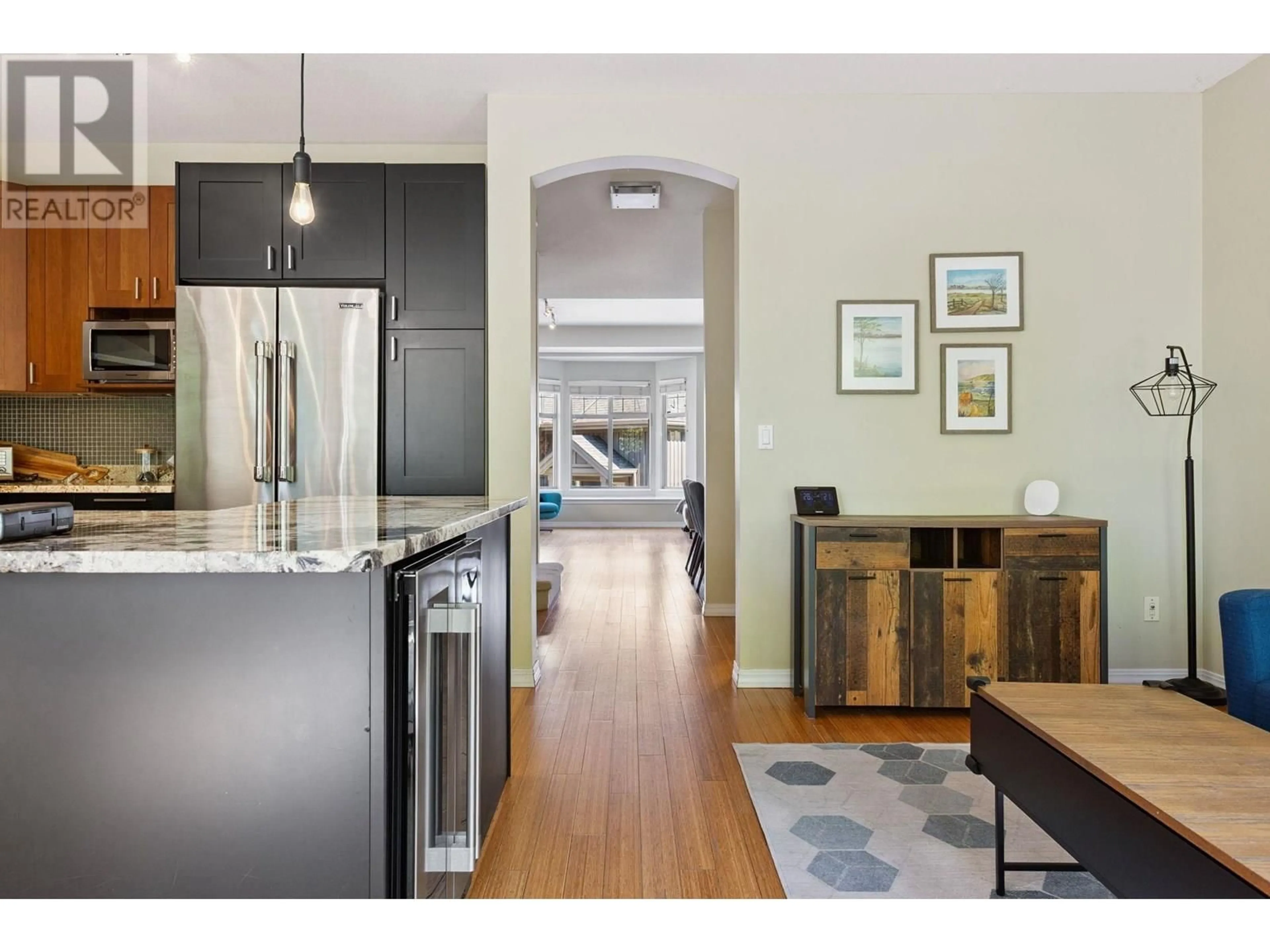 Open concept kitchen, wood/laminate floor for 15 - 8868 16TH AVENUE, Burnaby British Columbia V3N5A6