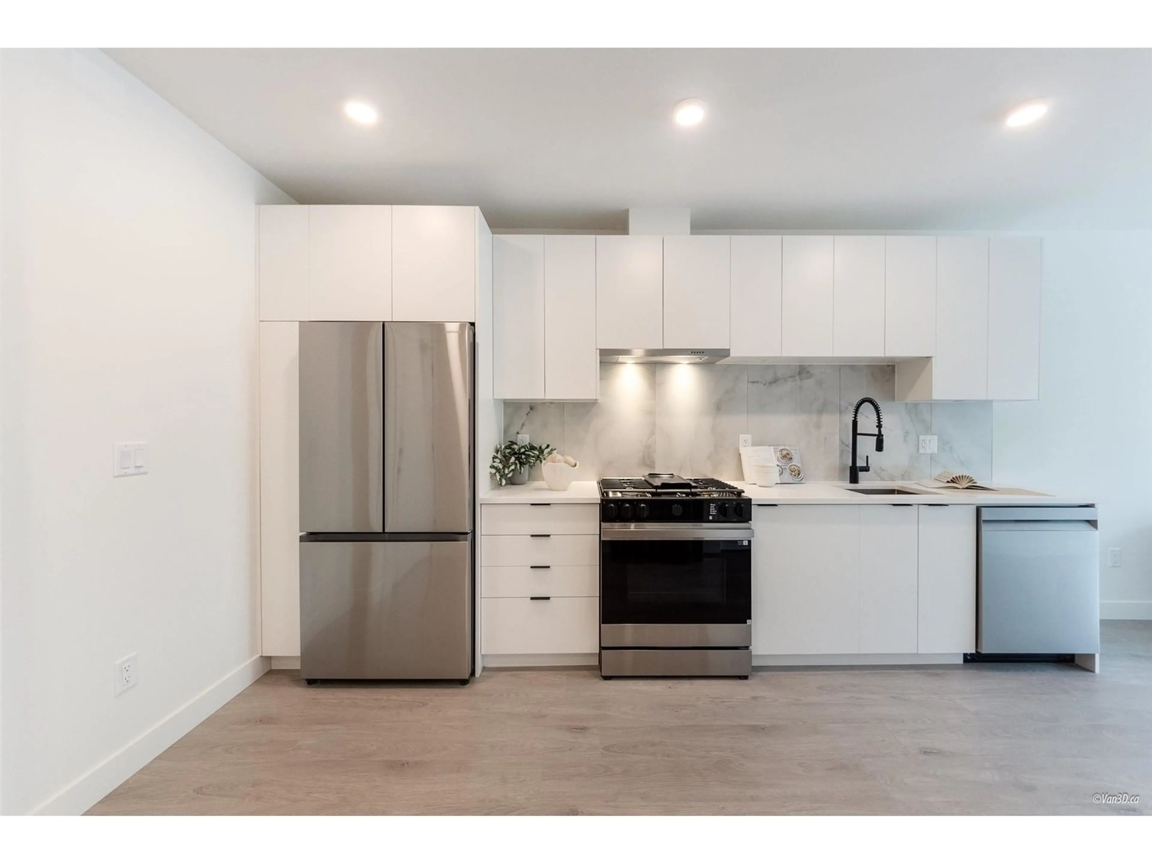 Open concept kitchen, unknown for 202 - 13238 105, Surrey British Columbia V3T0W1