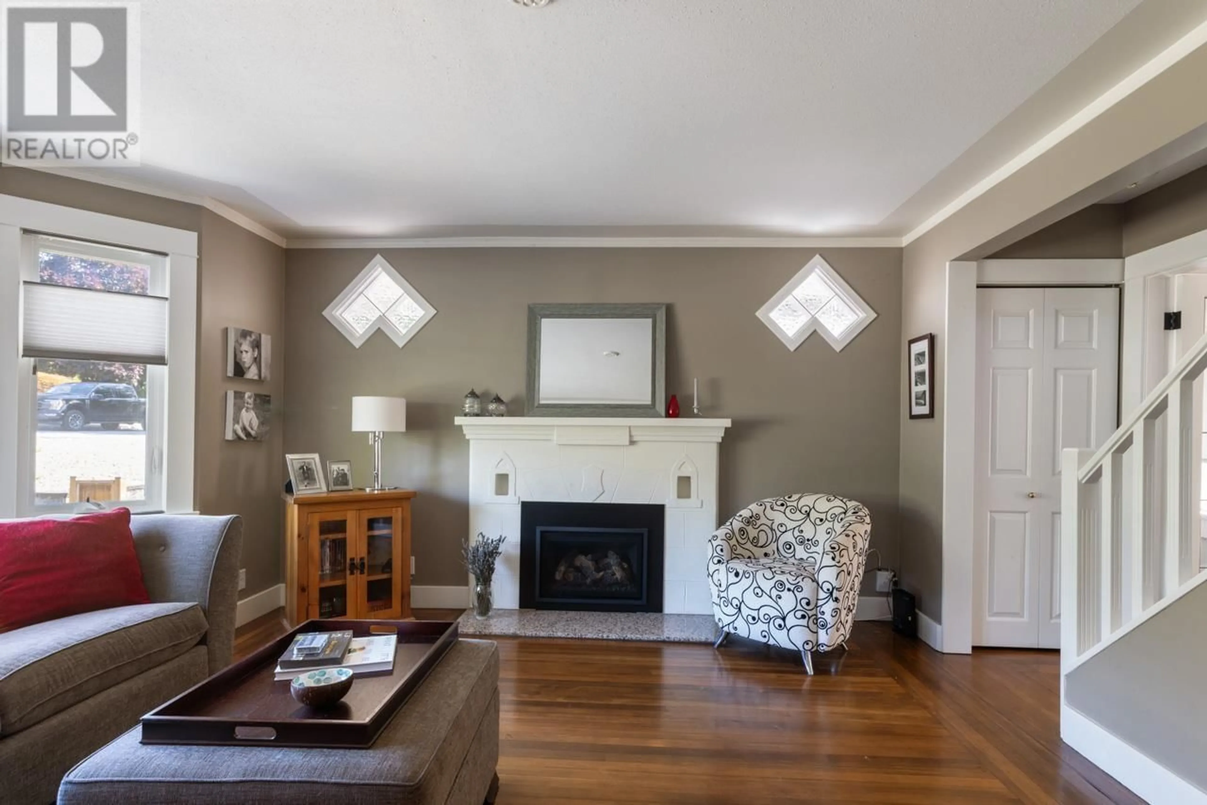 Living room with furniture, wood/laminate floor for 859 CALVERHALL STREET, North Vancouver British Columbia V7L1X8