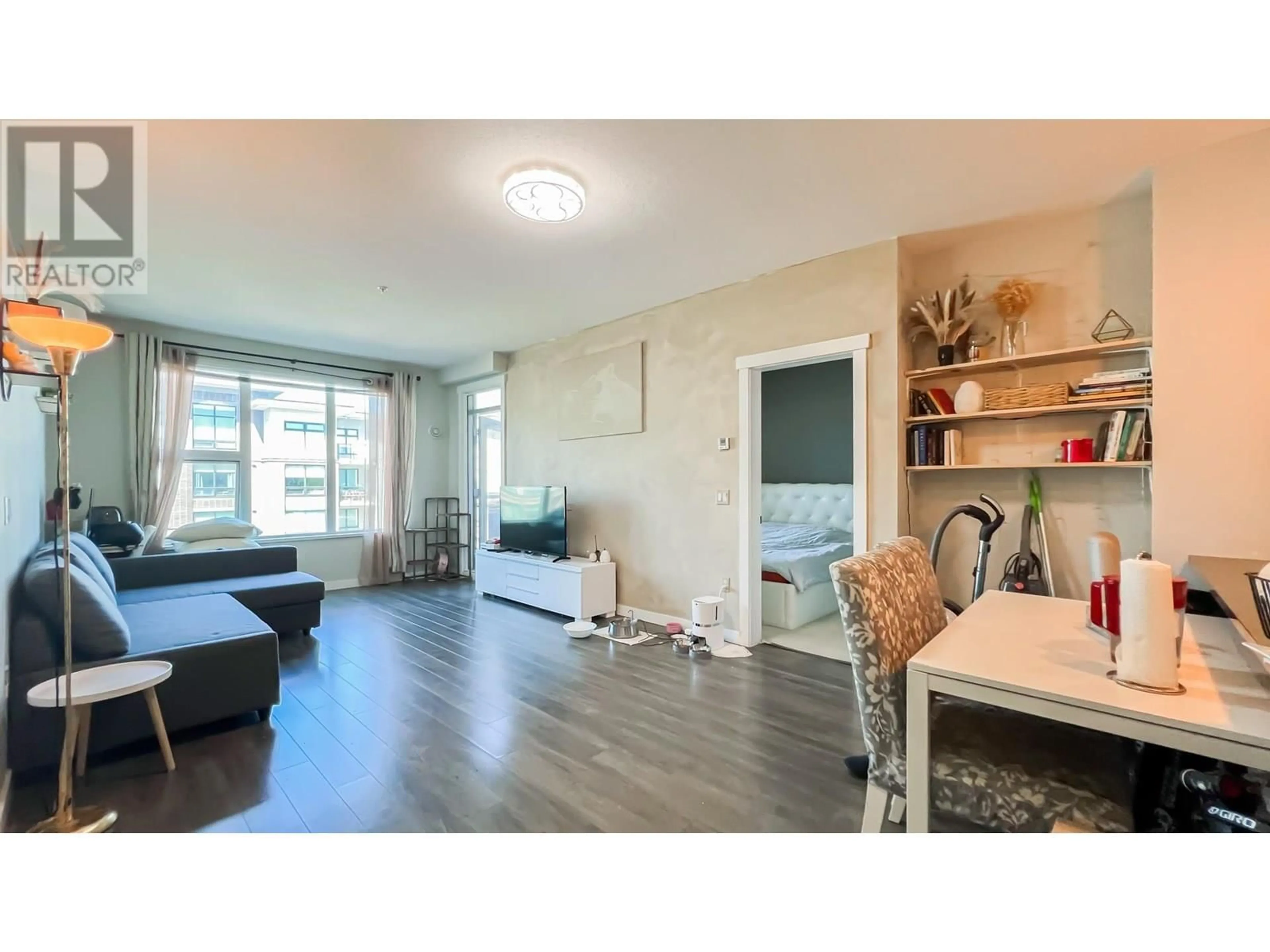 Living room with furniture, wood/laminate floor for 327 - 9366 TOMICKI AVENUE, Richmond British Columbia V6X0N9