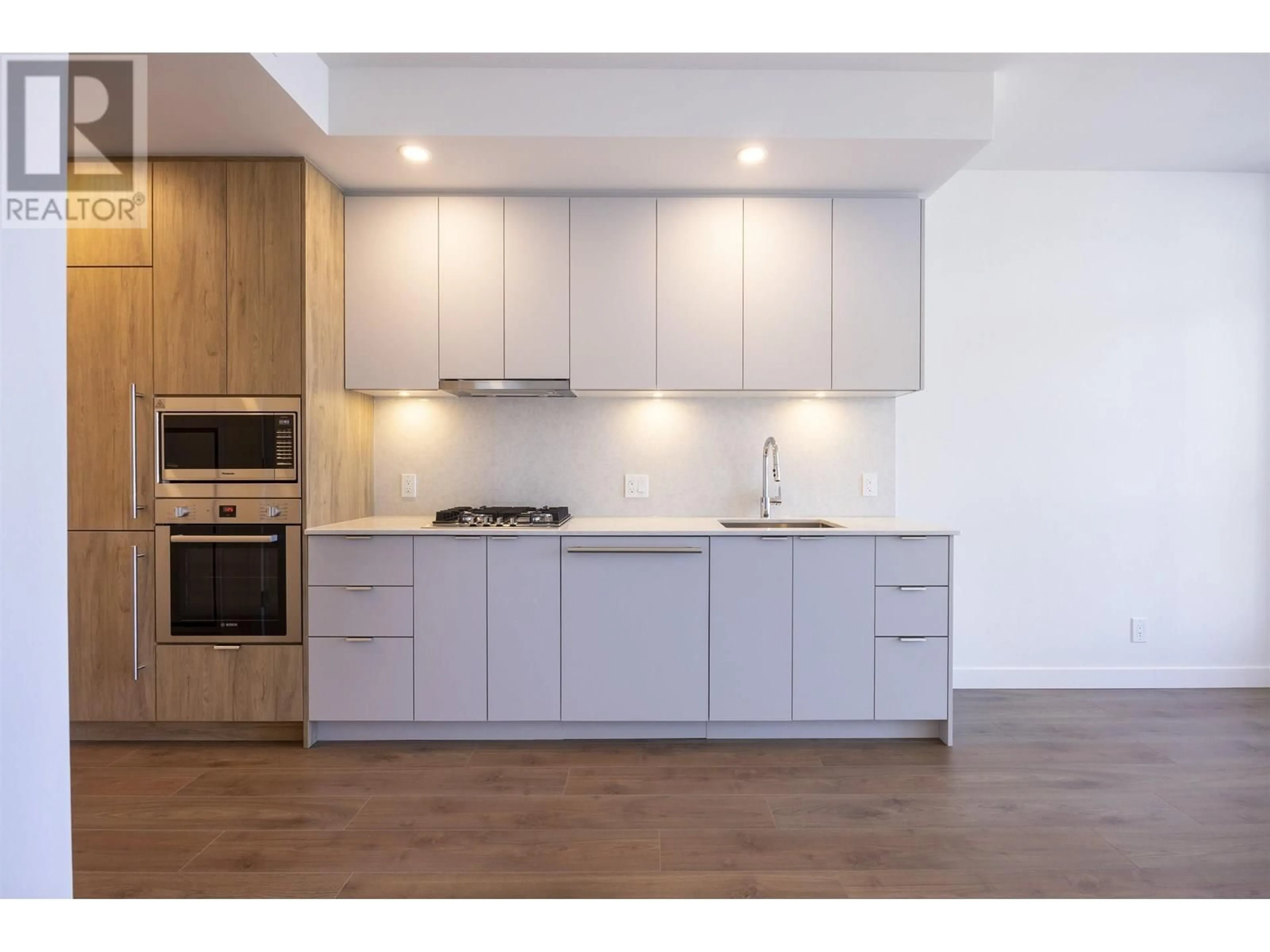 Open concept kitchen, wood/laminate floor for 1608 - 537 COTTONWOOD AVENUE, Coquitlam British Columbia V3J0S4