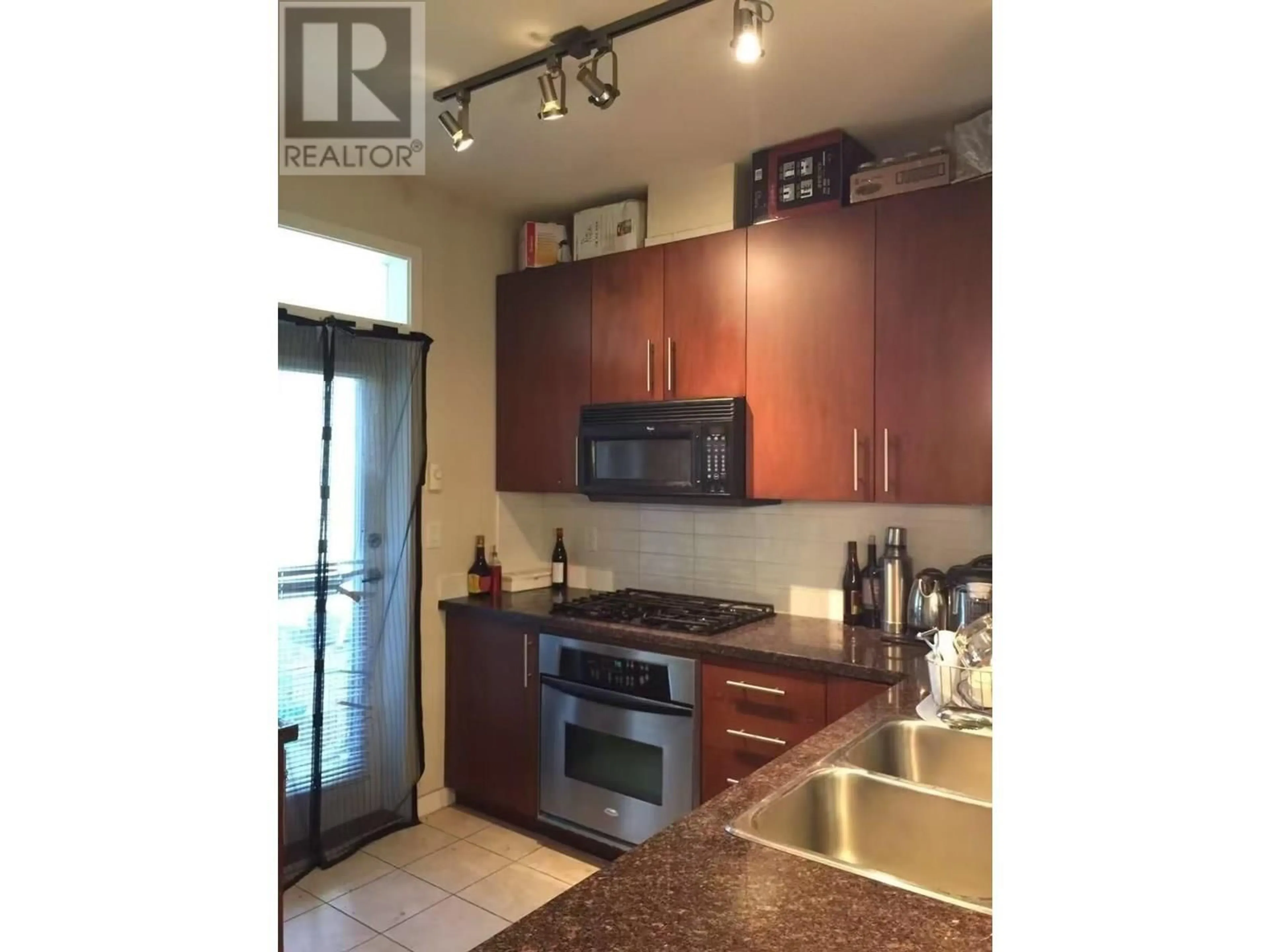 Open concept kitchen, unknown for 310 - 3651 FOSTER AVENUE, Vancouver British Columbia V5R0A2