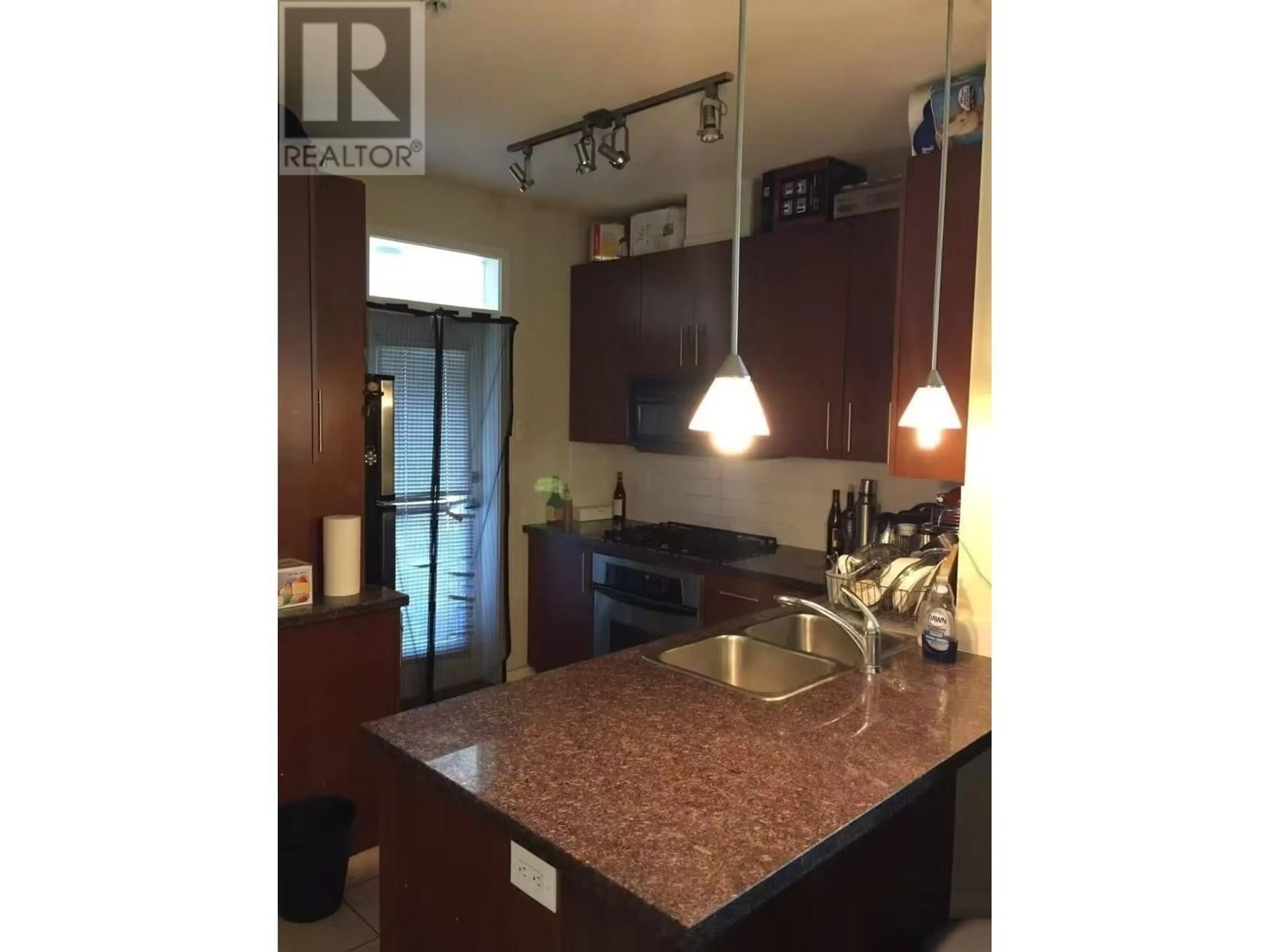 Open concept kitchen, unknown for 310 - 3651 FOSTER AVENUE, Vancouver British Columbia V5R0A2